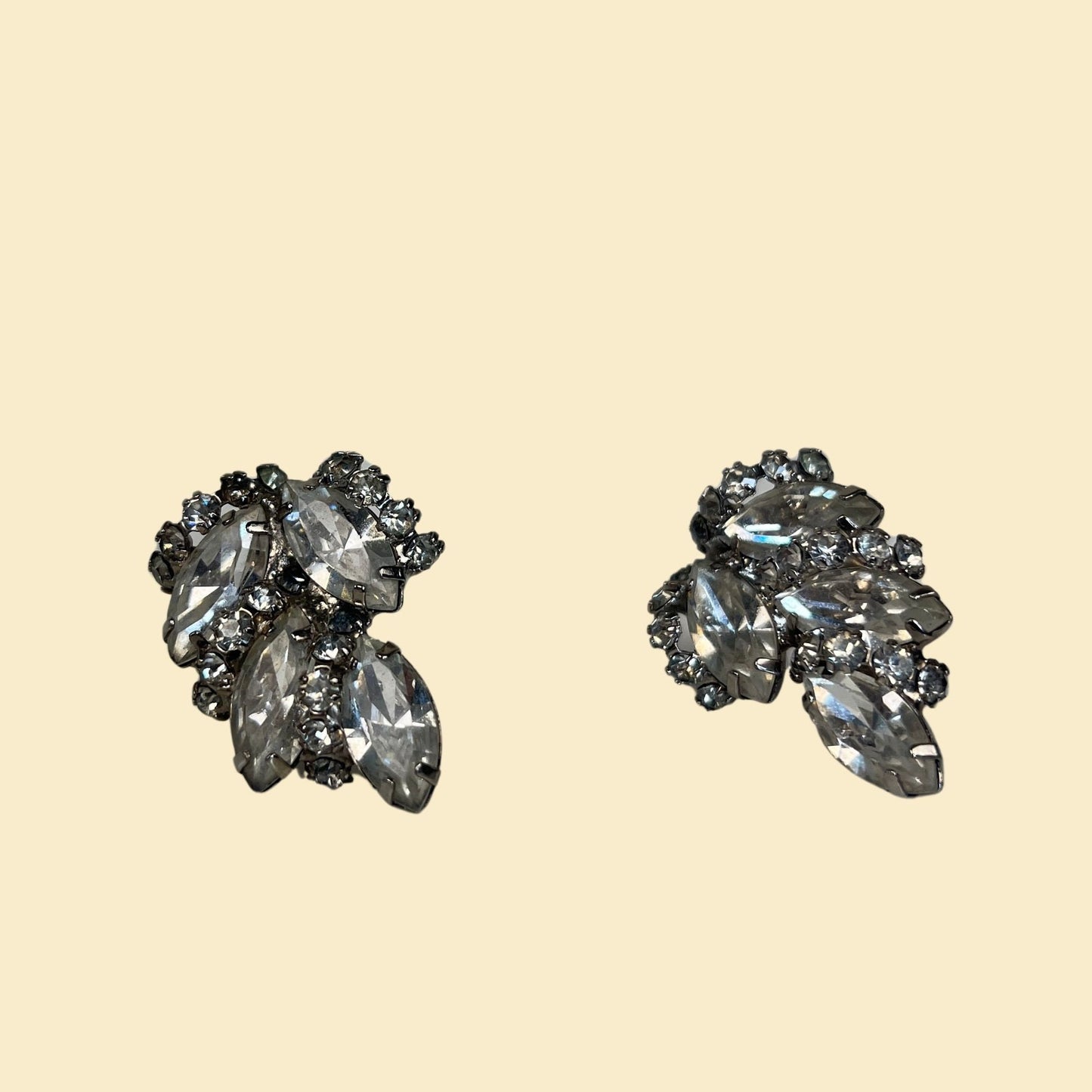 1950s clip on earrings by Alice Caviness, vintage silver-toned rhinestone cluster earrings, 50s costume jewelry