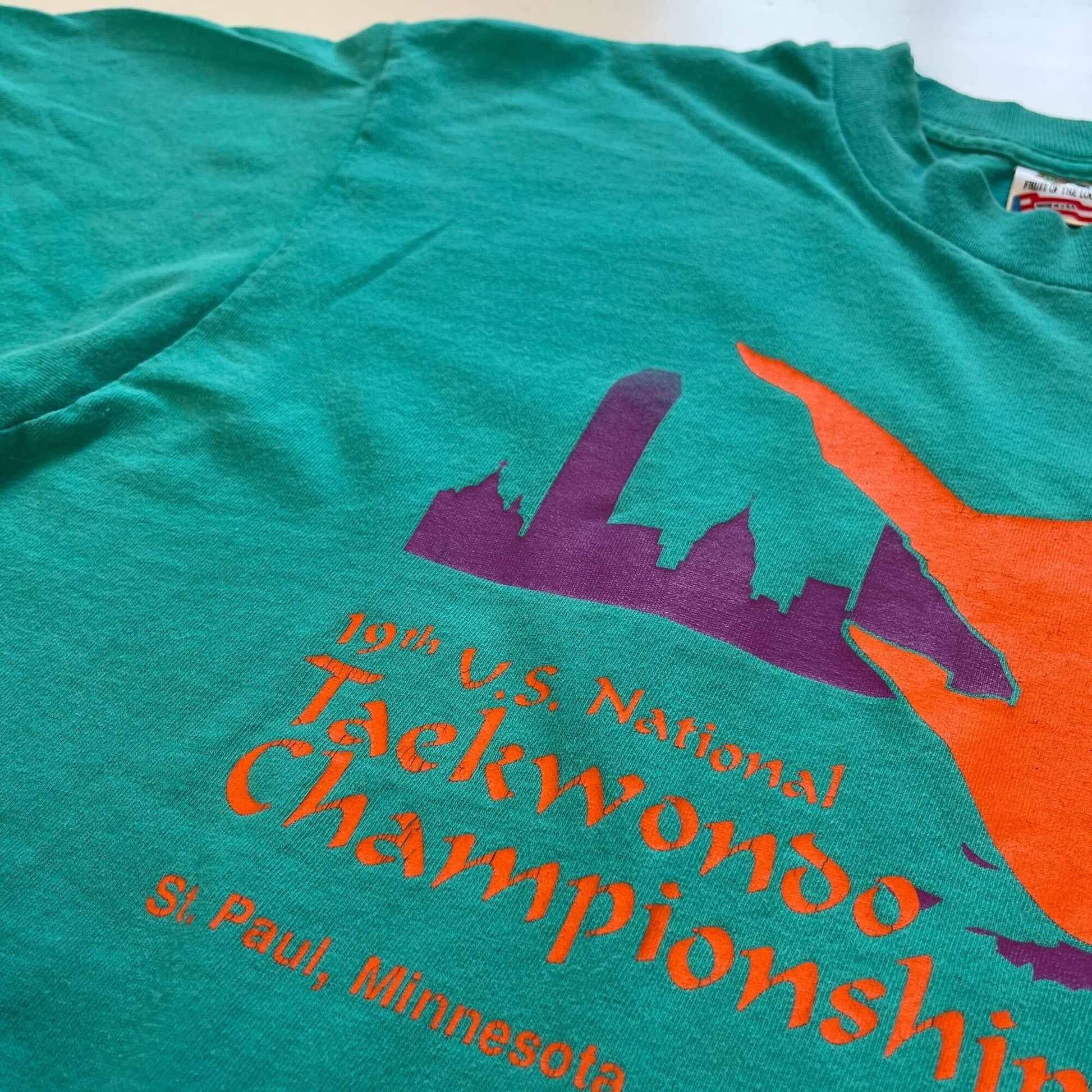 1990s Taekwondo t-shirt by Fruit of the Loom, size L single stitch teal blue, purple, and blue 1993 Tae Kwon Do championships shirt