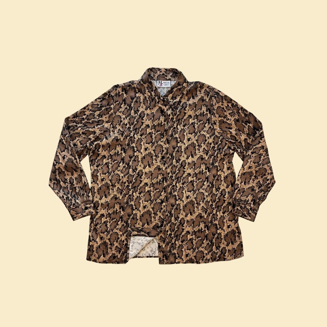 1990s geometric animal print blouse by Maggie Sweet, size L to XL women's brown & black patterned button down