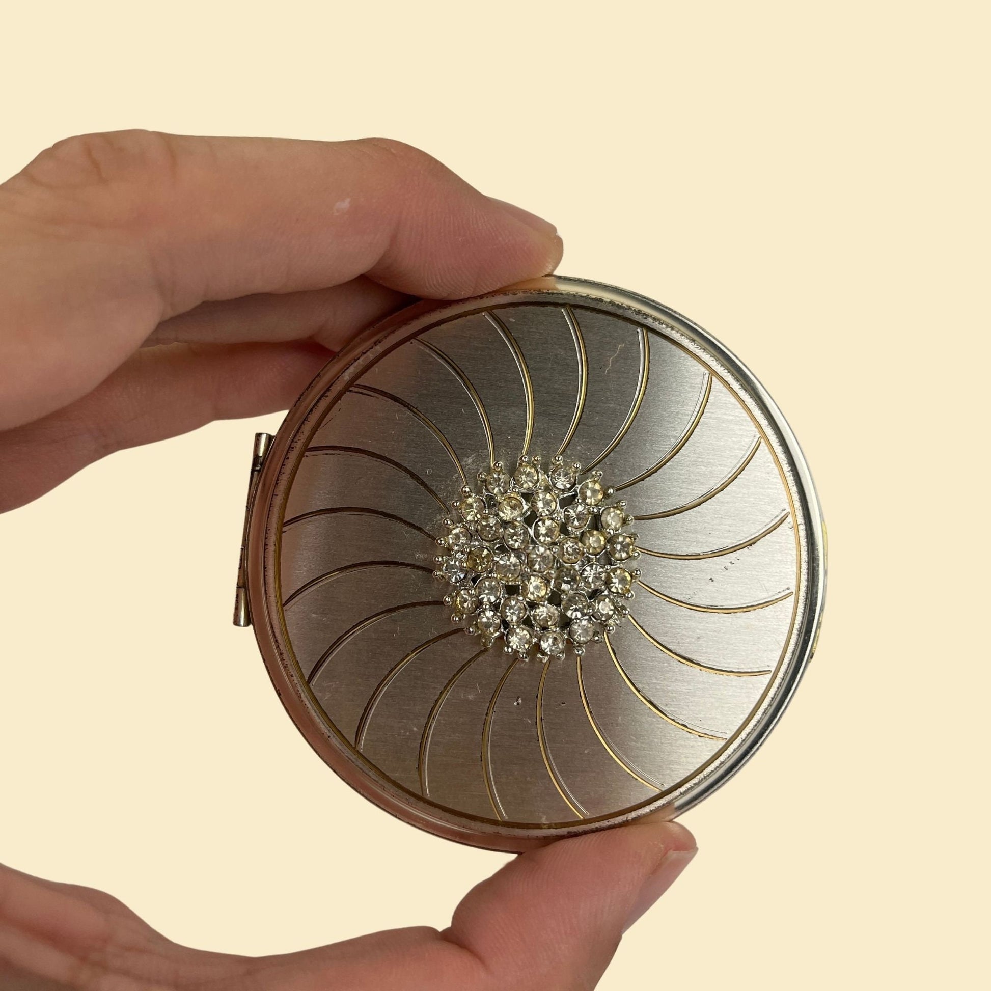 1940s Volupté compact, vintage 40s silver-toned circular compact with geometric design and rhinestones