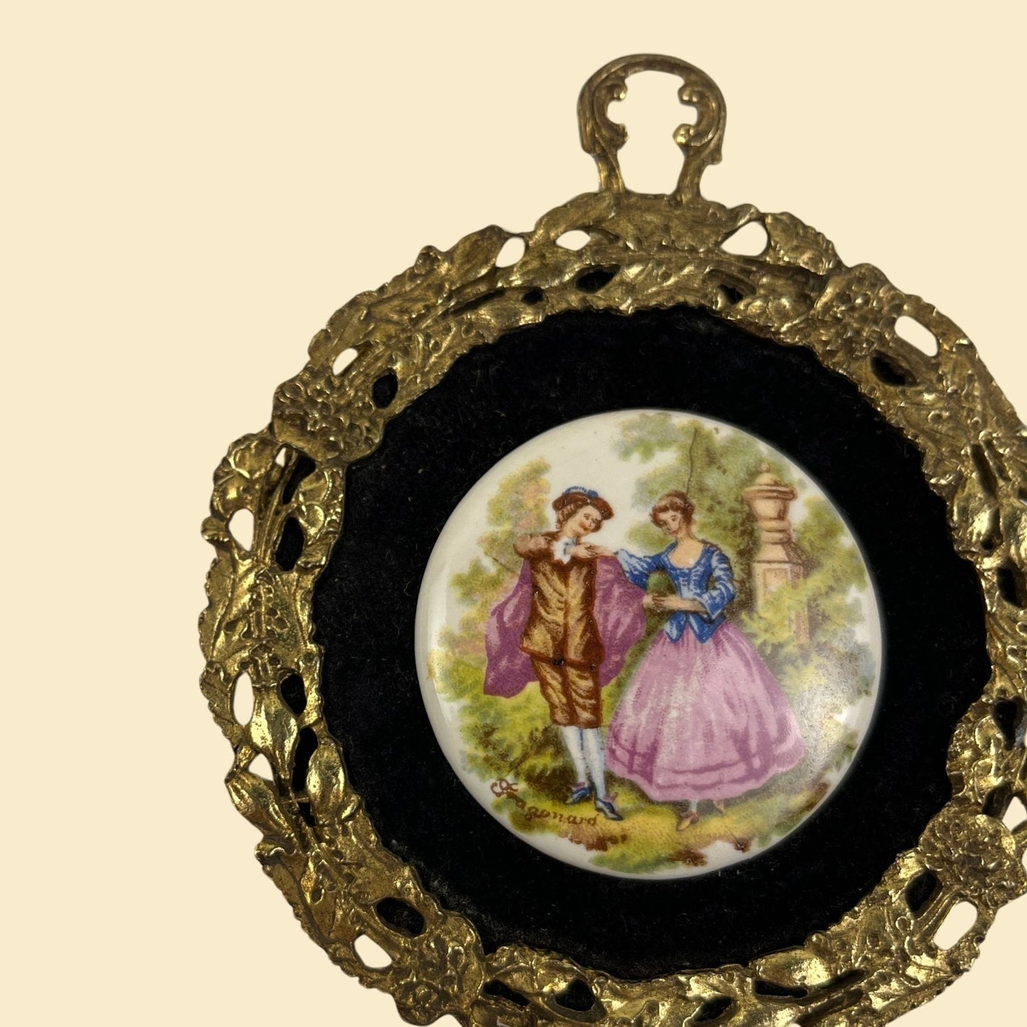 1970s framed porcelain cameo scene, vintage 70s circular brass frame w/ velvet matte-ing and victorian scene