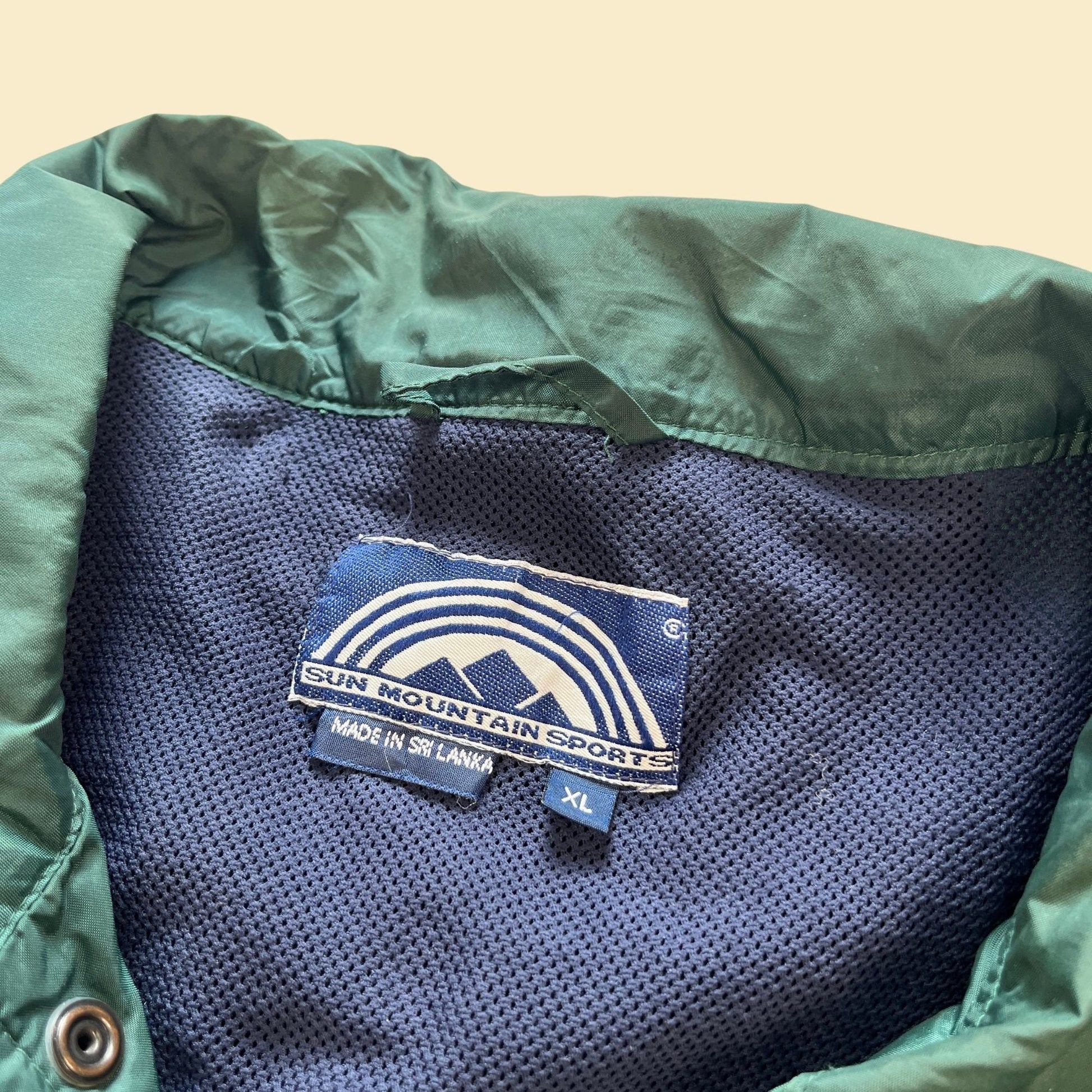 1990s XL windbreaker jacket by Sun Mountain Sports, blue & green vintage 90s zip up trainer jacket