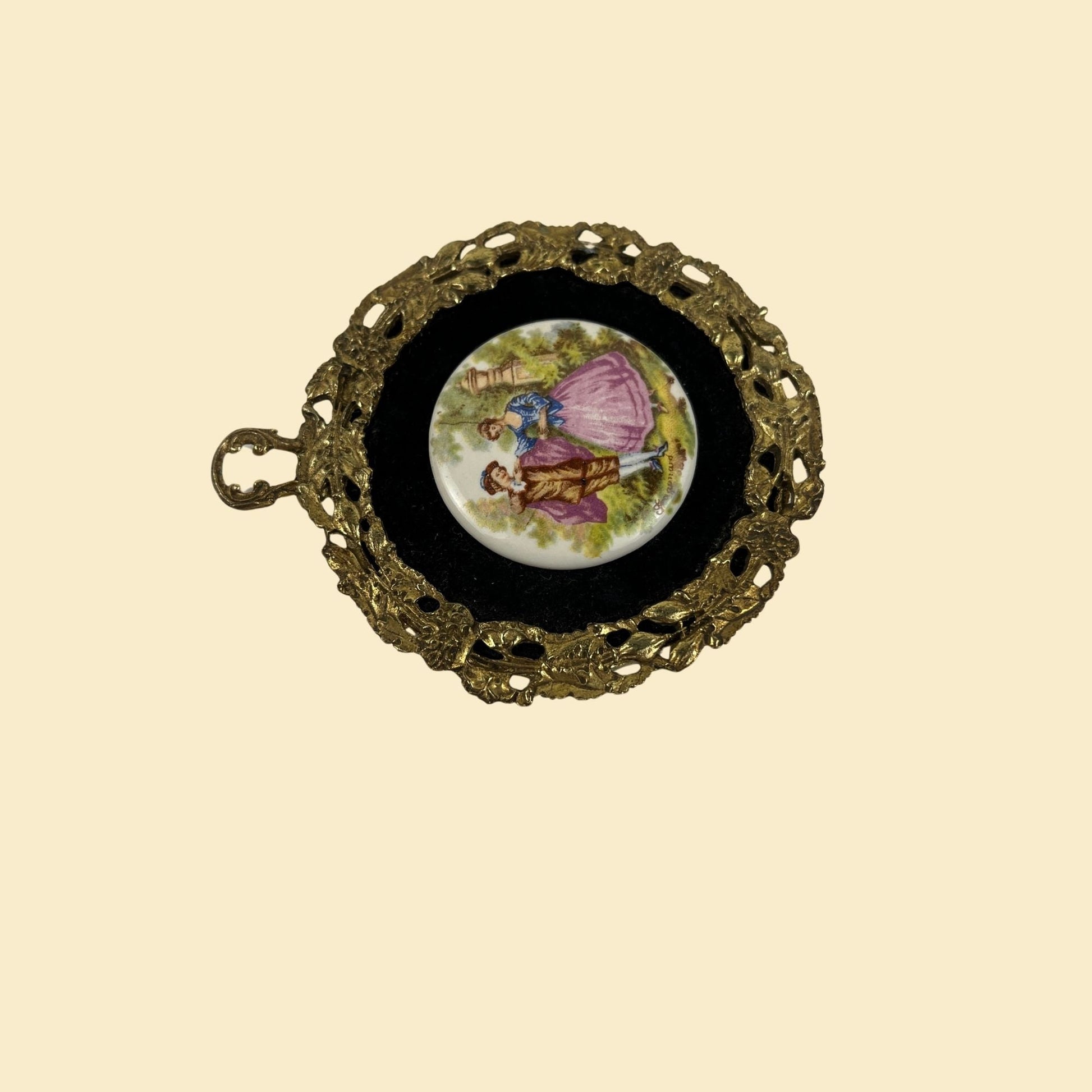 1970s framed porcelain cameo scene, vintage 70s circular brass frame w/ velvet matte-ing and victorian scene