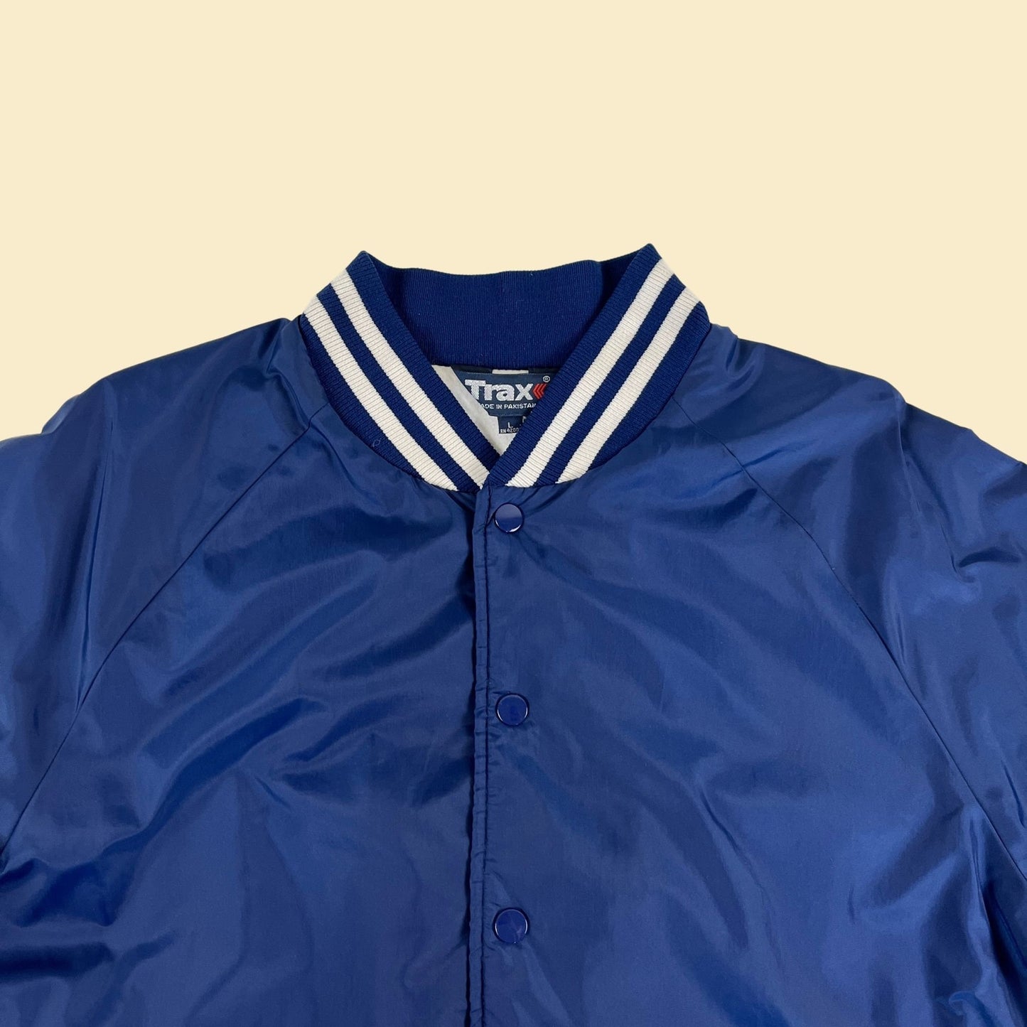 1980s L blue bomber jacket by Trax, vintage 80s/90s blue & white windbreaker jacket w/ snap closures