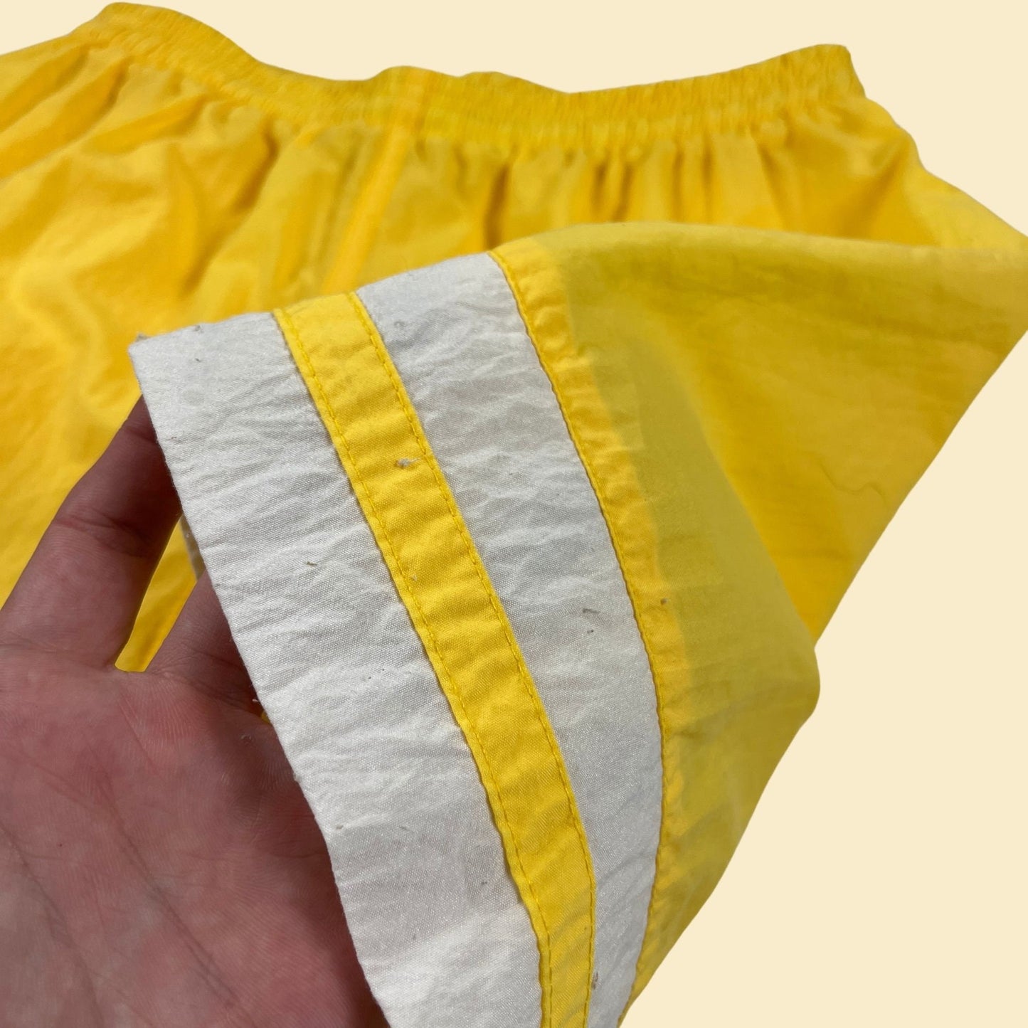 80s/90s Reebok athletic shorts, size M yellow & white women's vintage 1990s workout shorts