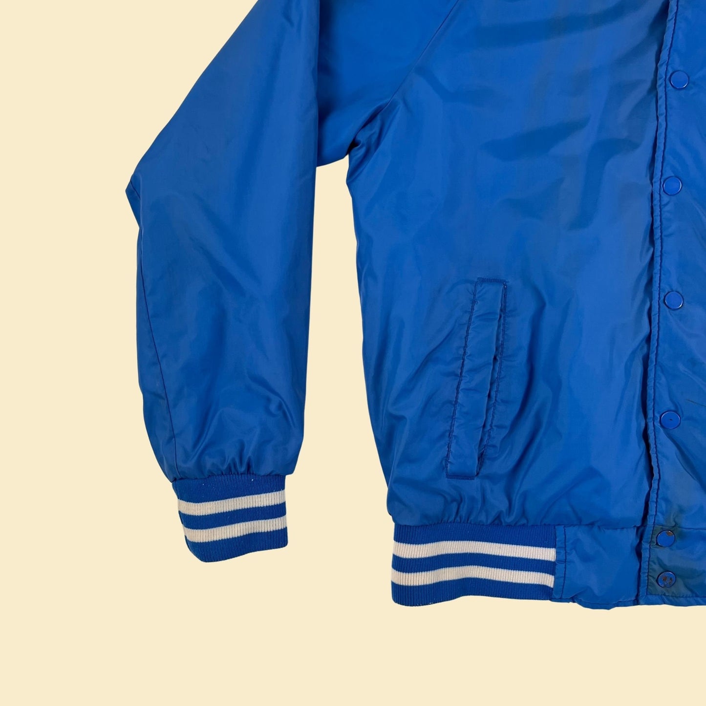 1990s blue bomber windbreaker jacket by Trax,