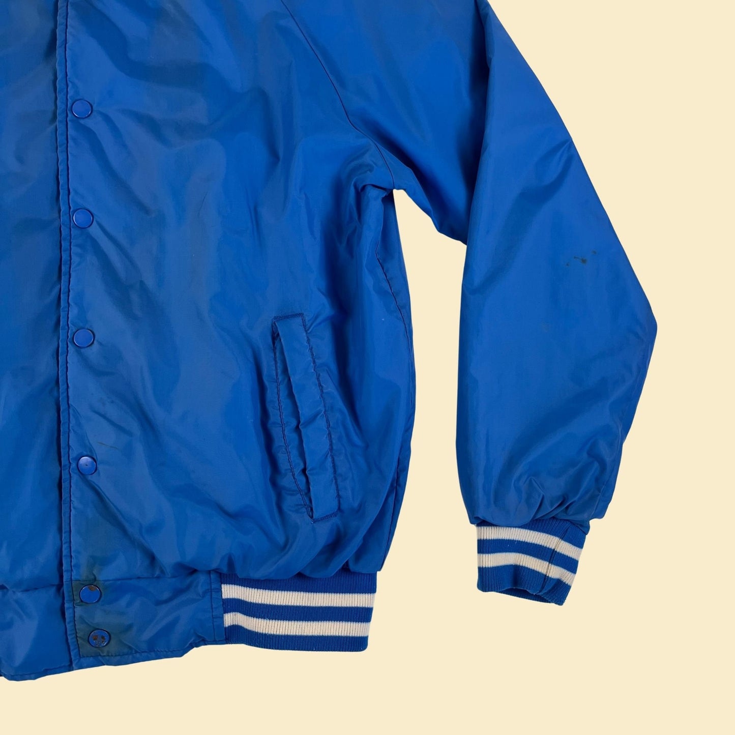 1990s blue bomber windbreaker jacket by Trax,