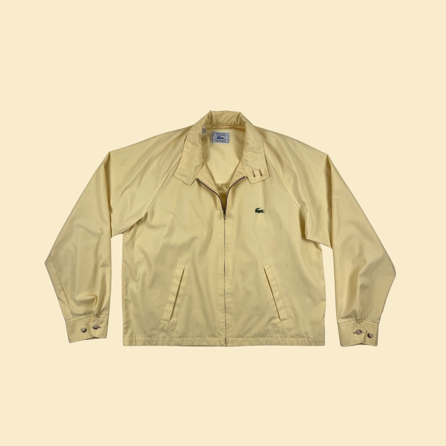 1970s L Izod Lacoste windbreaker, pastel yellow vintage 70s zip up jacket