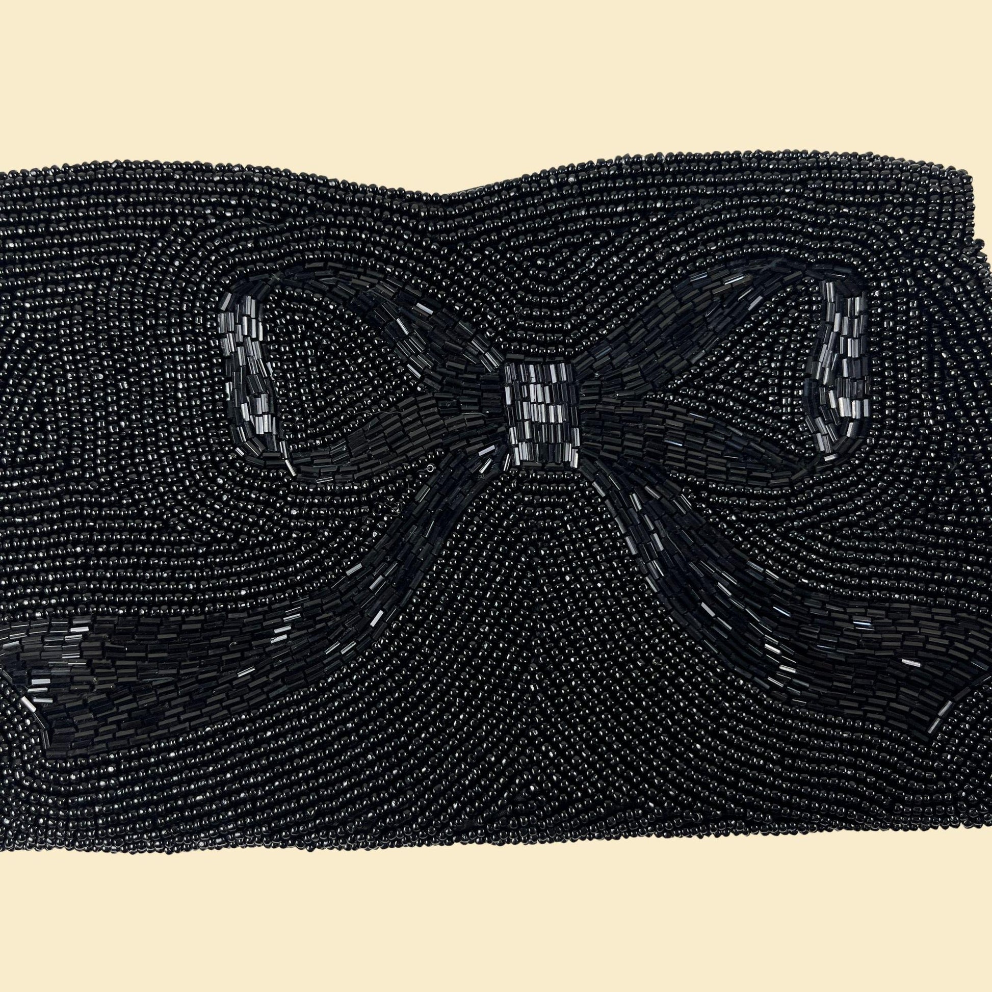 1960s La Regale black beaded clutch bag, vintage handbag wallet w/ bowtie design & top zip closure