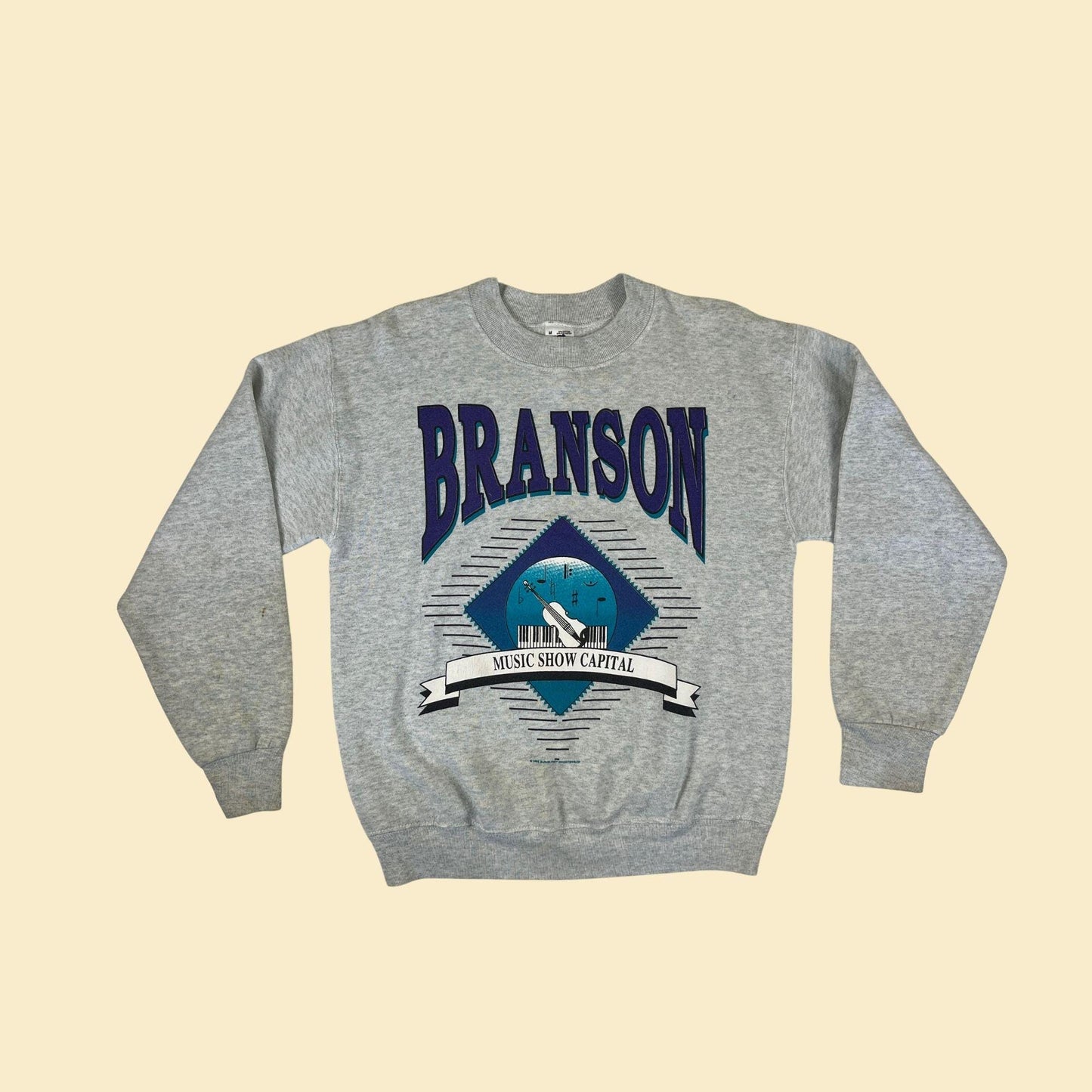 1995 M Branson crewneck sweatshirt, vintage 90s Music Show Capital grey pullover by Fruit of the Loom w/ purple & teal print