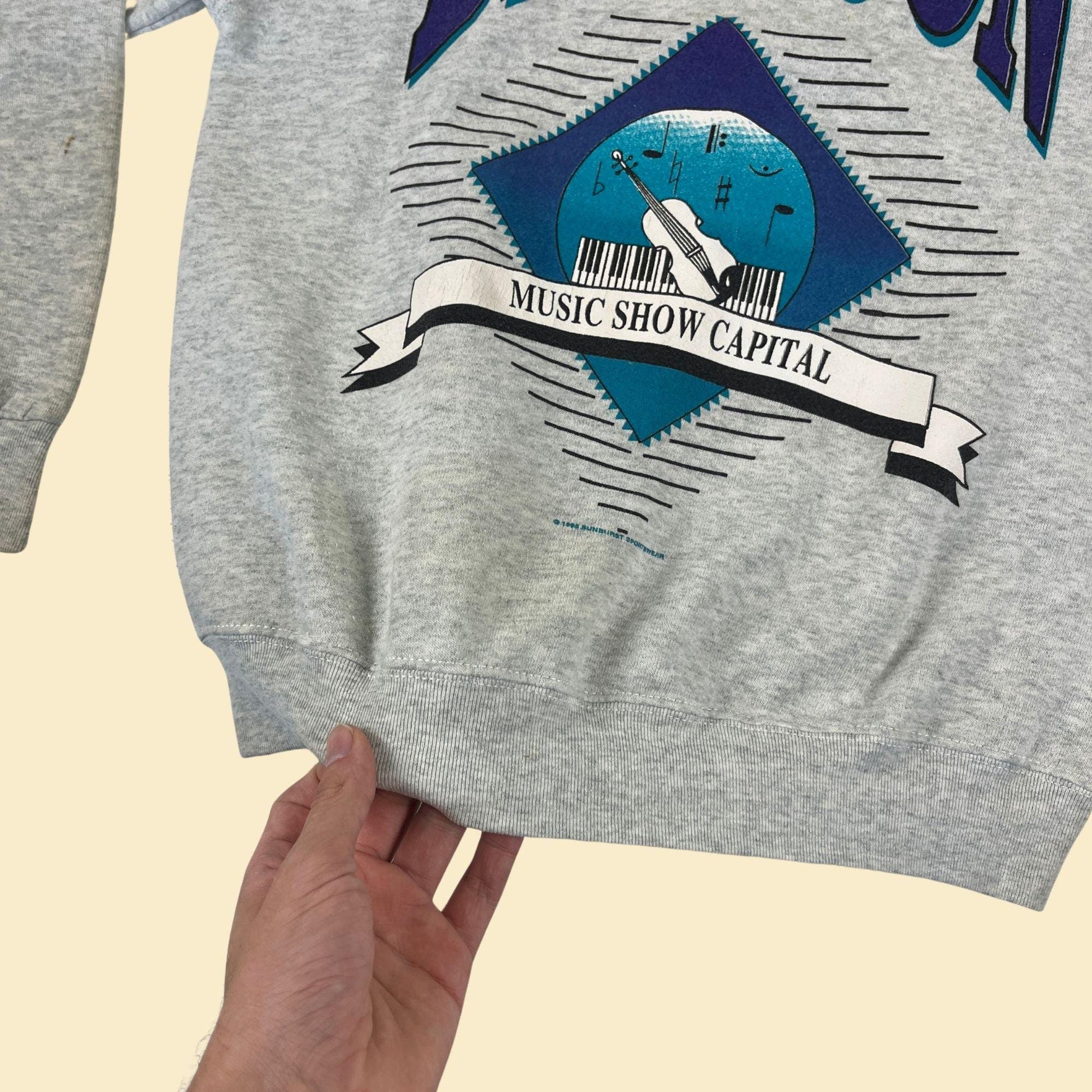 1995 M Branson crewneck sweatshirt, vintage 90s Music Show Capital grey pullover by Fruit of the Loom w/ purple & teal print