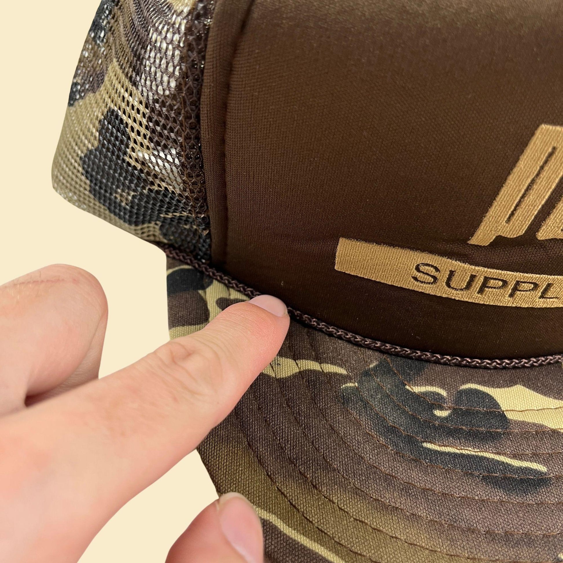 80s camo Paine Supply Inc. snapback hat, vintage San Sun green & brown trucker cap w/ adjustable back