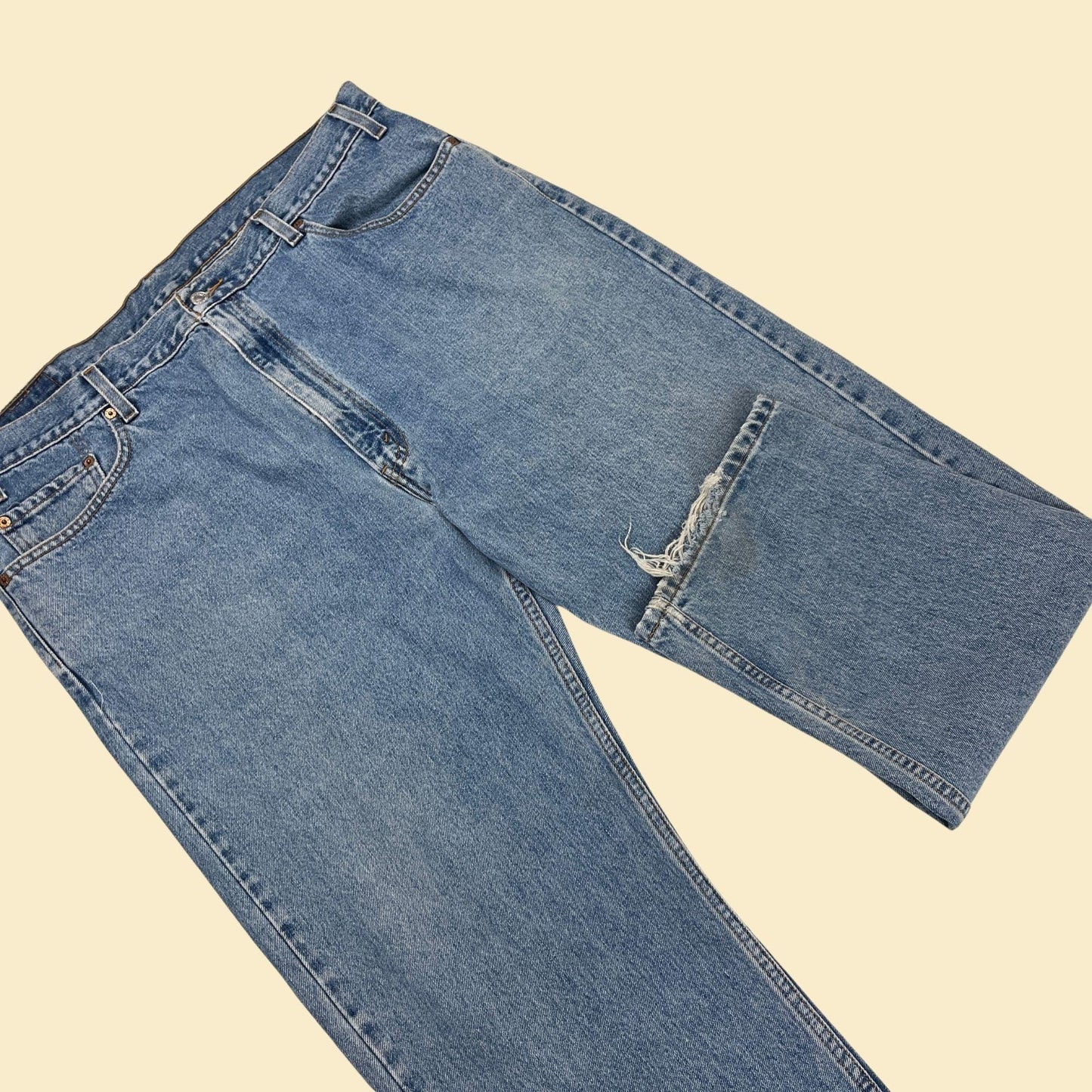 90s Levi's 505 jeans, vintage 42x30 men's medium to light wash regular fit straight leg denim pants