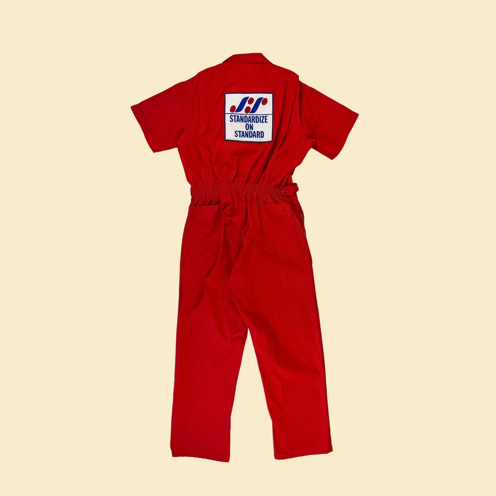 1970s flight suit by Toppmaster, vintage XL, Tall red one-piece coveralls w/ "Standardize on Standard" patches