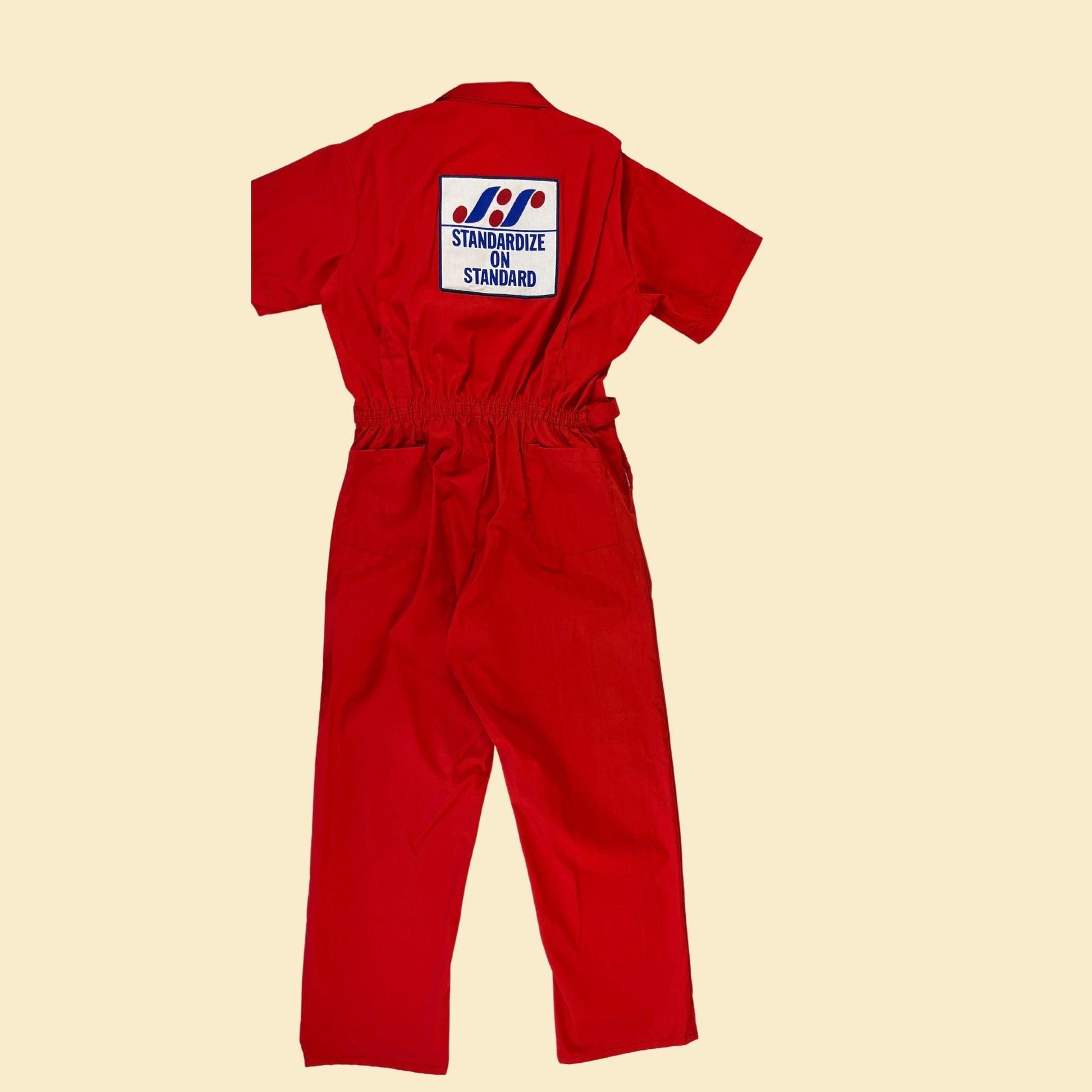 1970s flight suit by Toppmaster, vintage XL, Tall red one-piece coveralls w/ "Standardize on Standard" patches