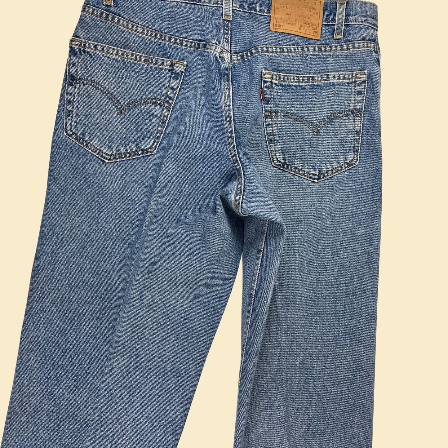 1990s Levi's 550 36x29 jeans, vintage medium wash blue denim relaxed fit pants