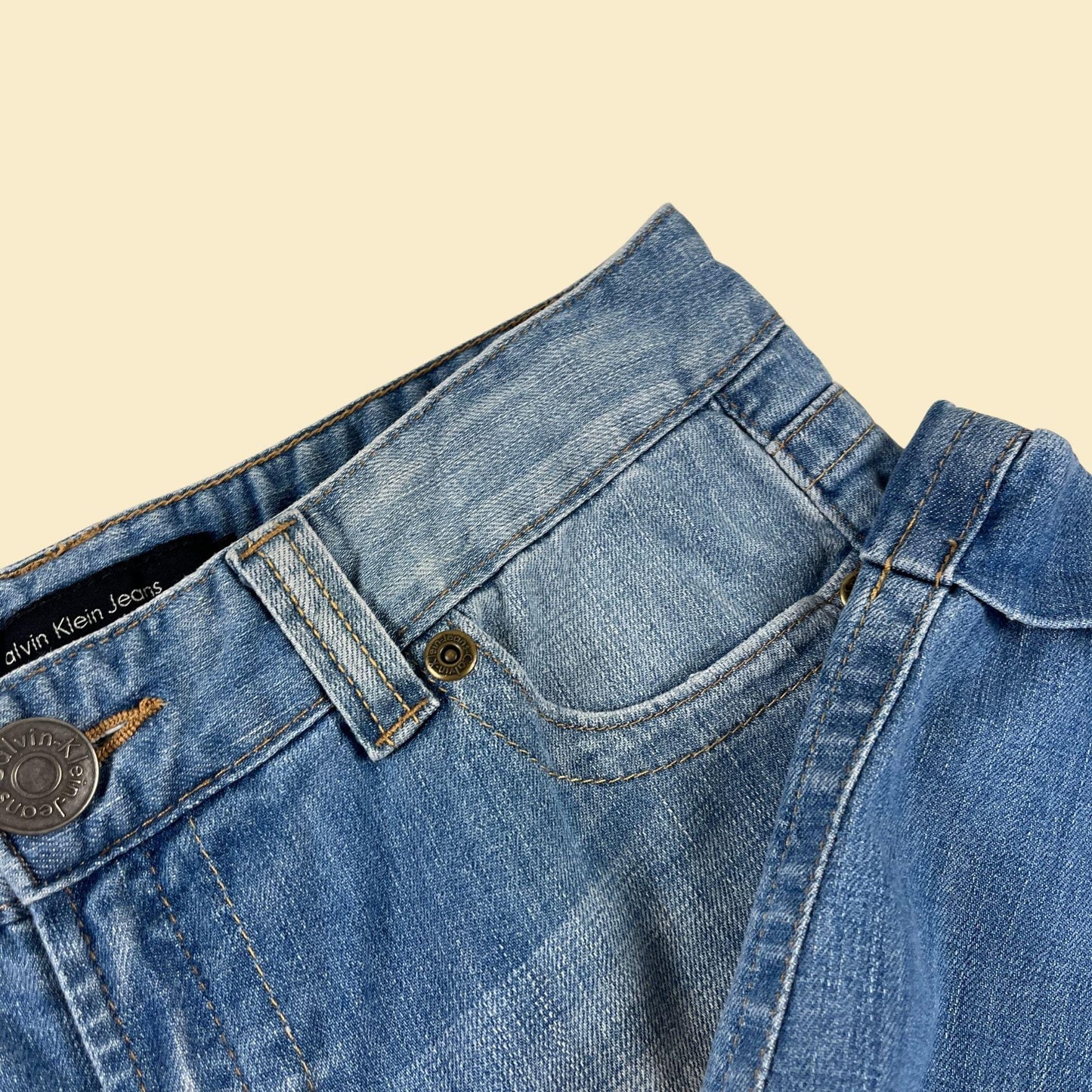 90s Calvin Klein size 10 women's shorts/capris, vintage denim medium wash cuffed shorts