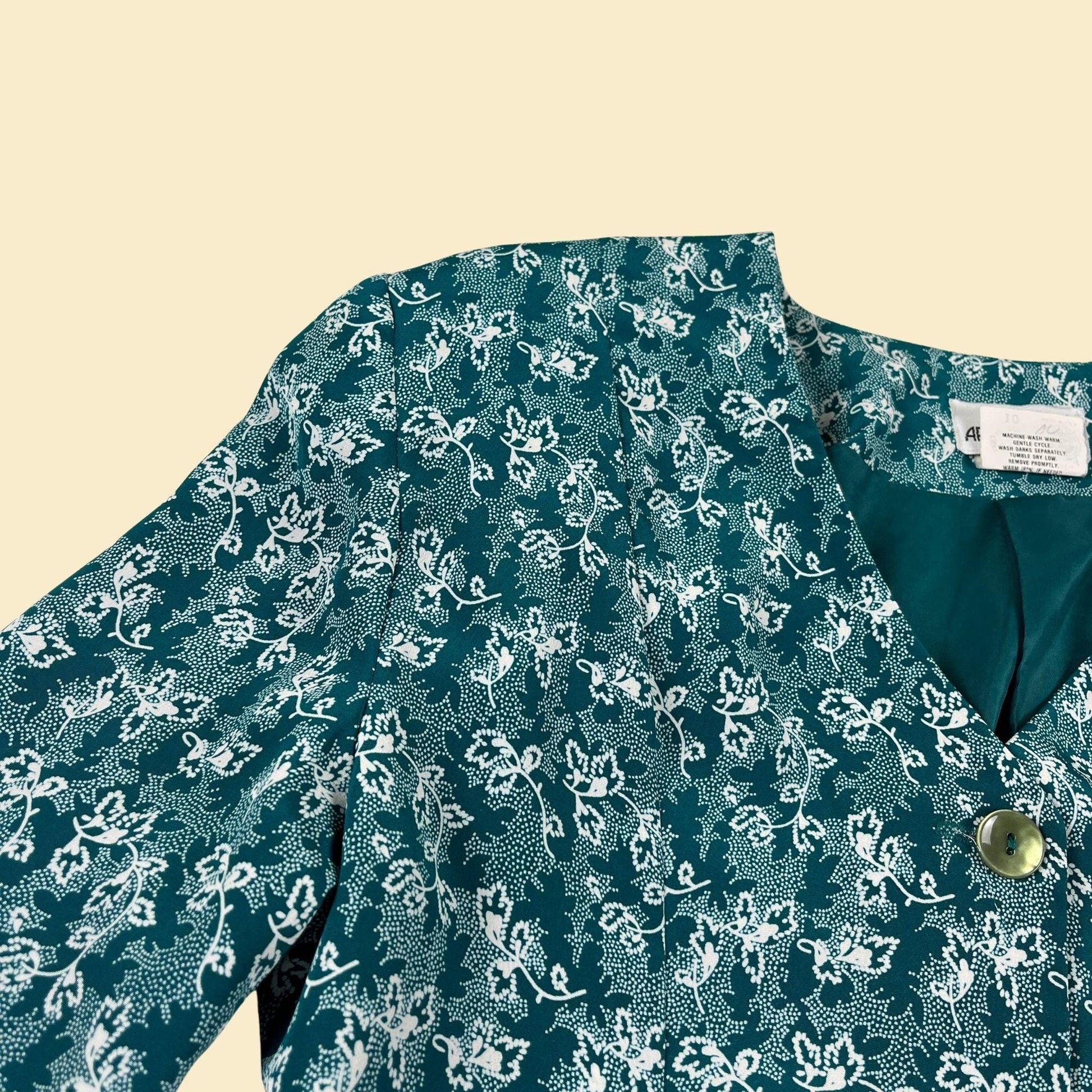 70s/80s teal & white size 10 blouse by Apostrophe, abstract floral patterned top w/ shoulder pads