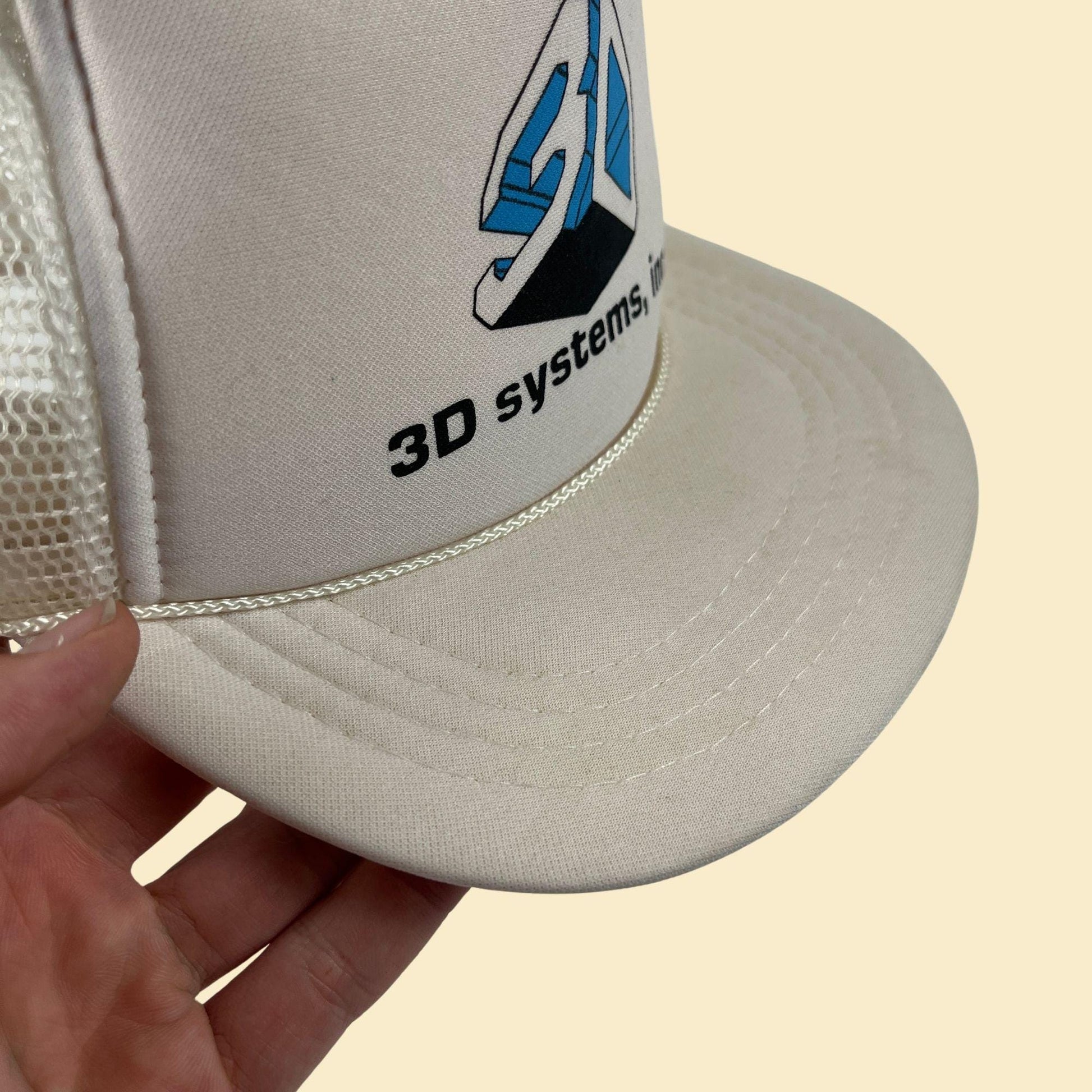 80s/90s snapback w/ 3D Systems logo, vintage white "youth size" white & blue baseball cap