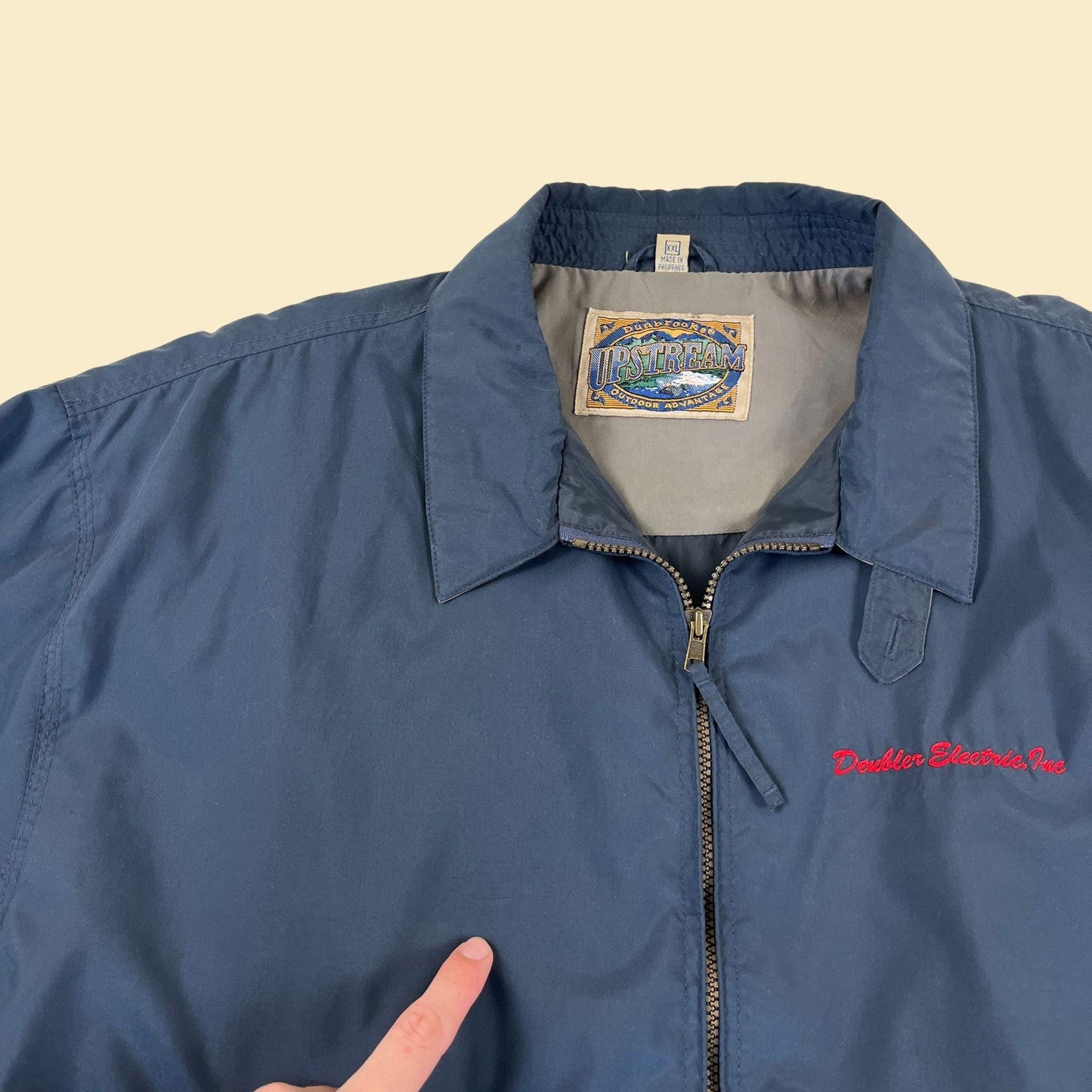 90s/Y2K blue XXL windbreaker jacket by Dunbrooke, vintage Deubler Electric workwear jacket