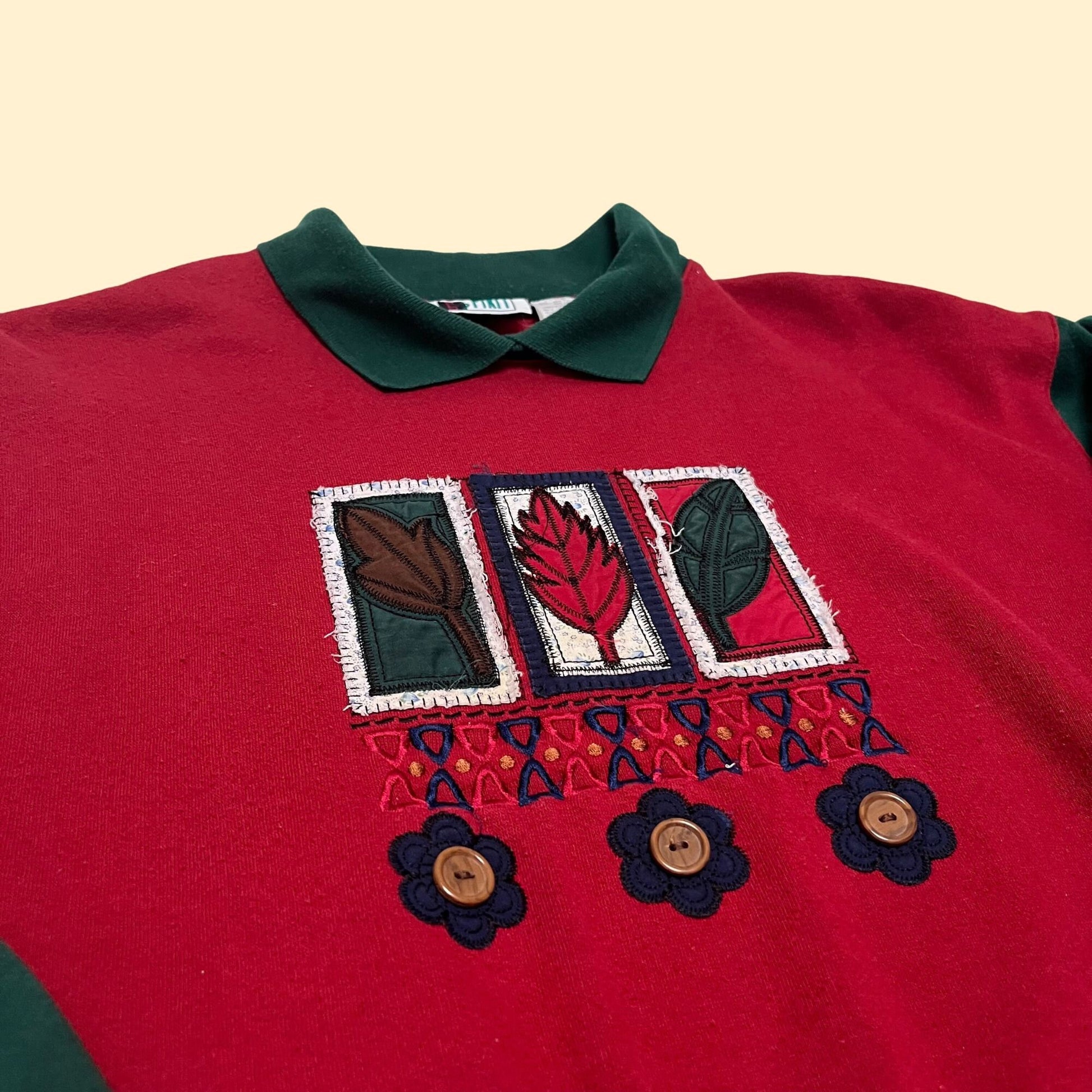 90s small patchwork floral and leaf patterned grandma sweatshirt, collared pullover shirt with red and green colorblock