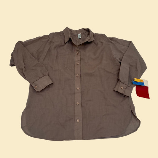 Vintage 1970s brown button down shirt. Has original tags from the 70s.