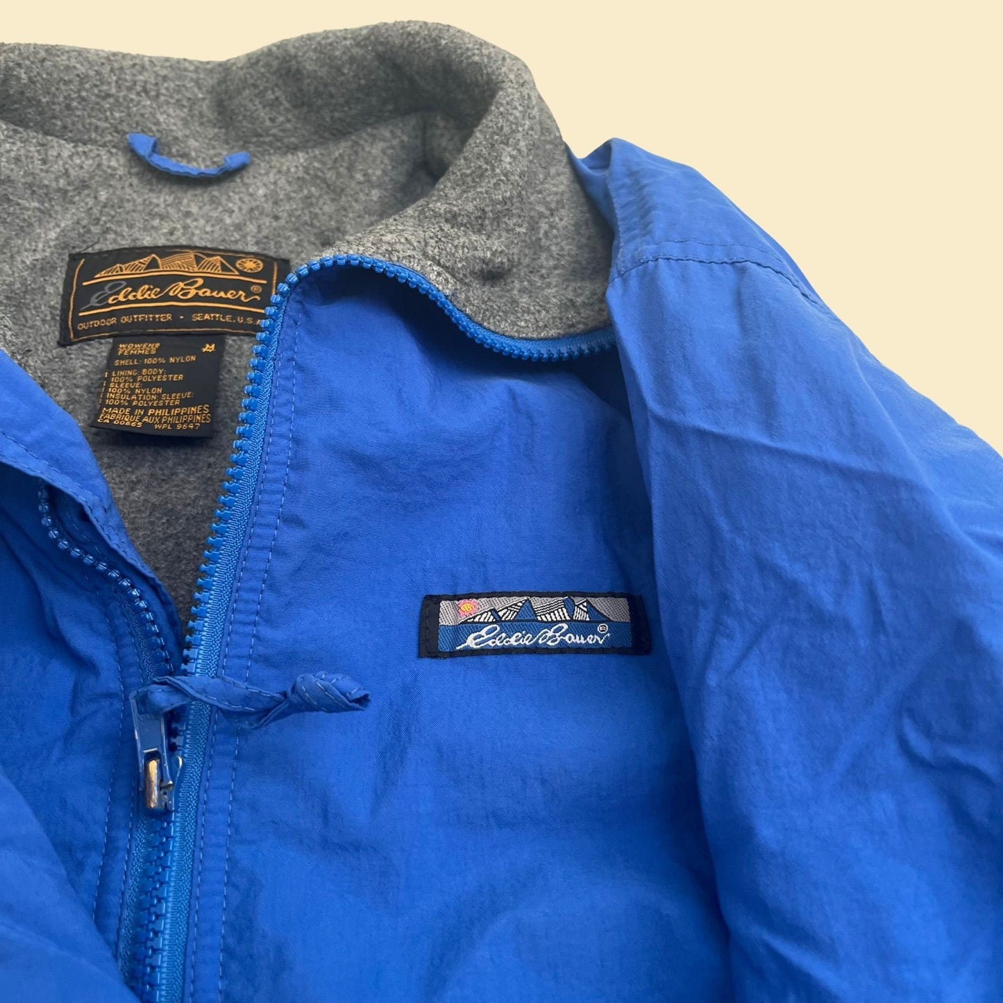 90s fleece lined nylon jacket by Eddie Bauer, medium women's vintage solid blue jacket, 1990s casual zip up windbreaker jacket