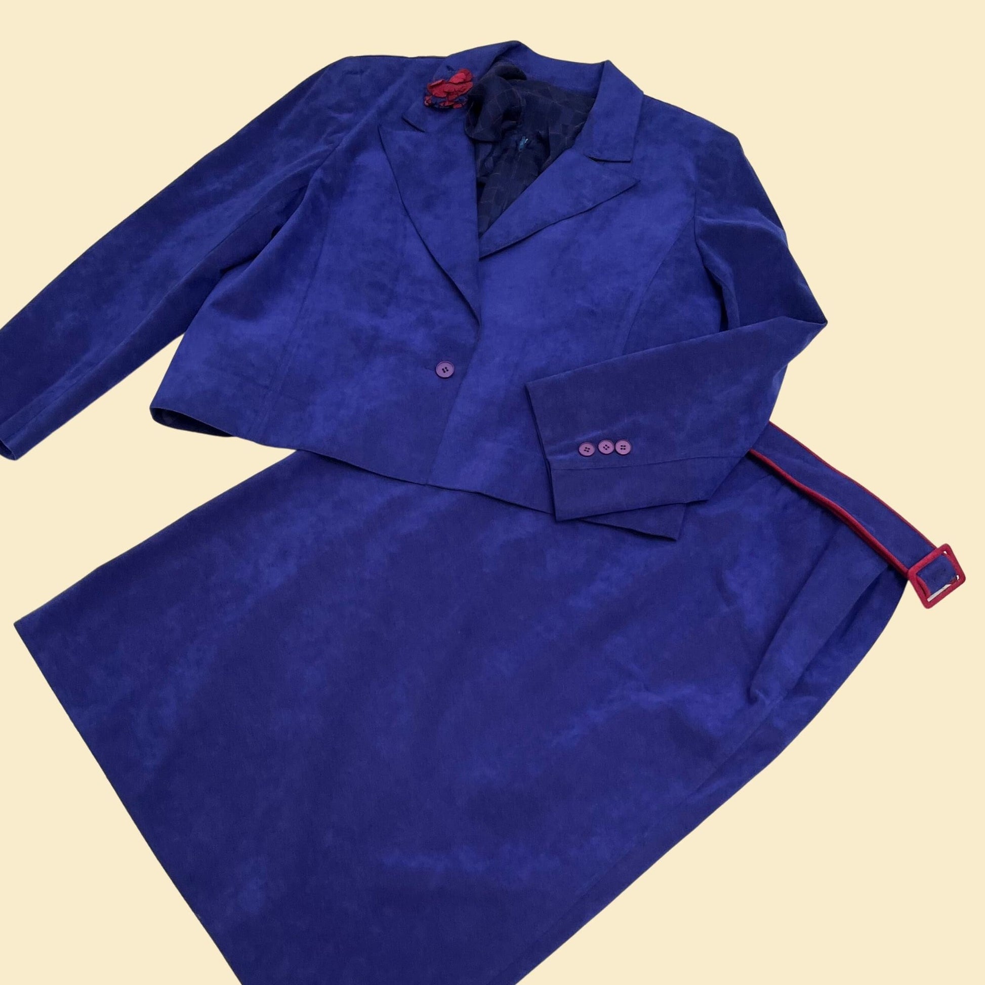 Vintage purple (indigo or blue hue) skirt suit from the 1970s.