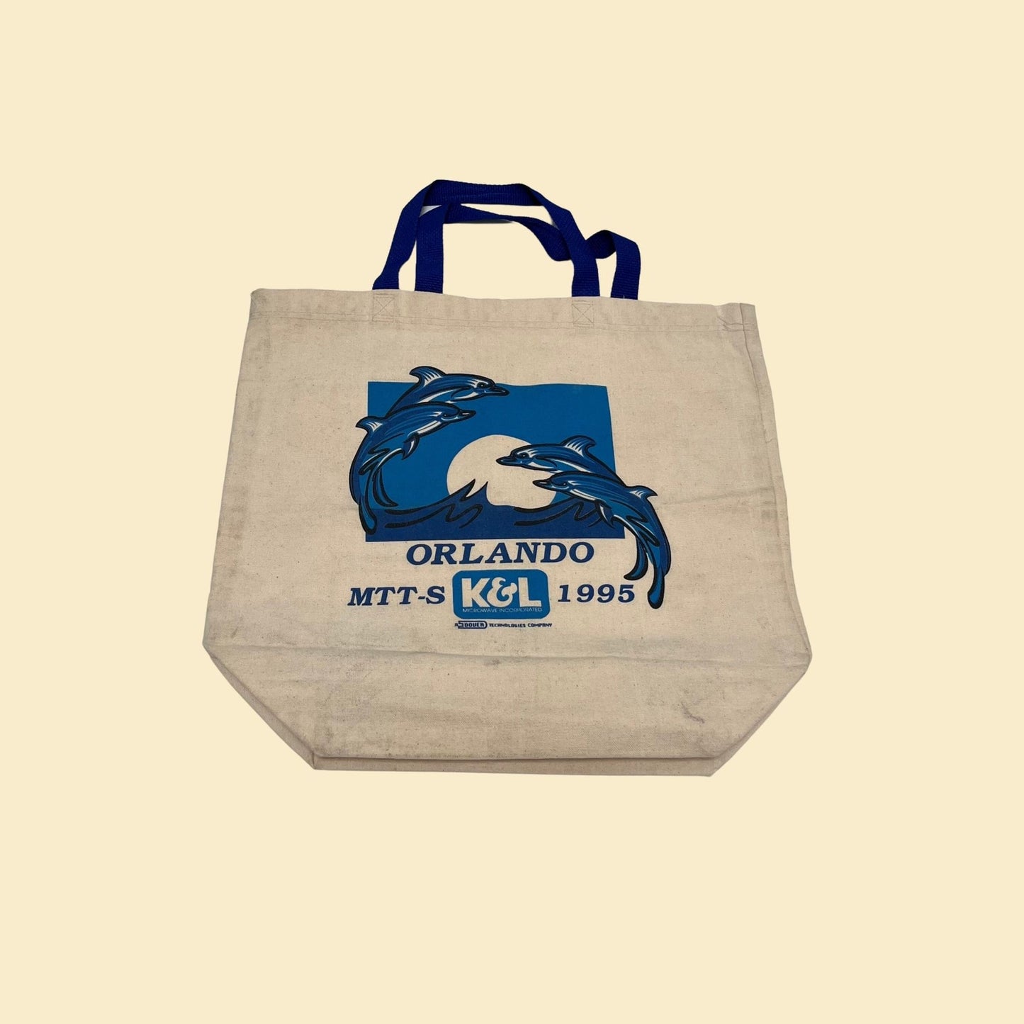 90s canvas tote bag with dolphin graphics & corporate logo, vintage tote bag in blue and beige, 1995 canvas bag