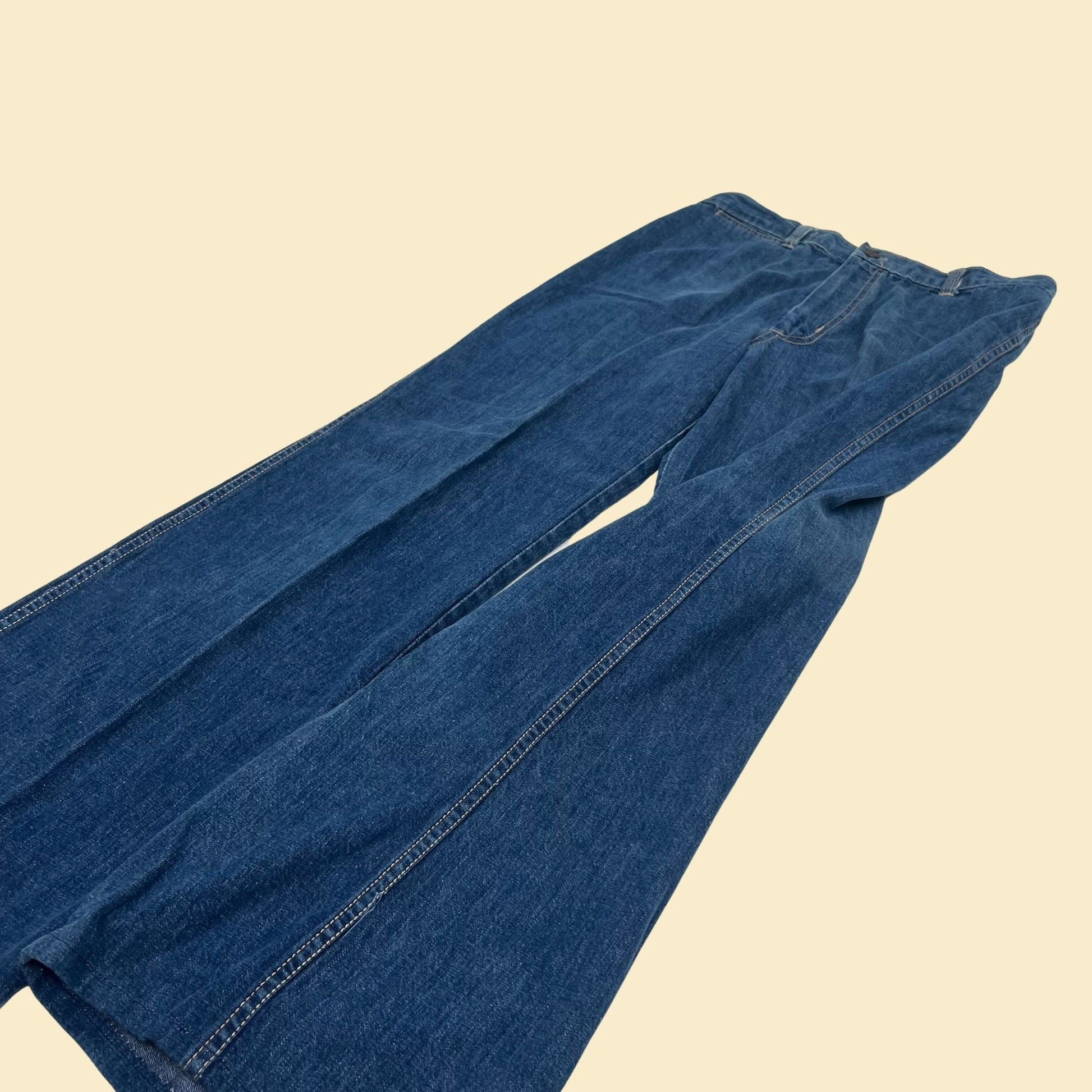 70s European Express jeans in size 15, vintage medium washed denim with slight flare, 1970s women's pants