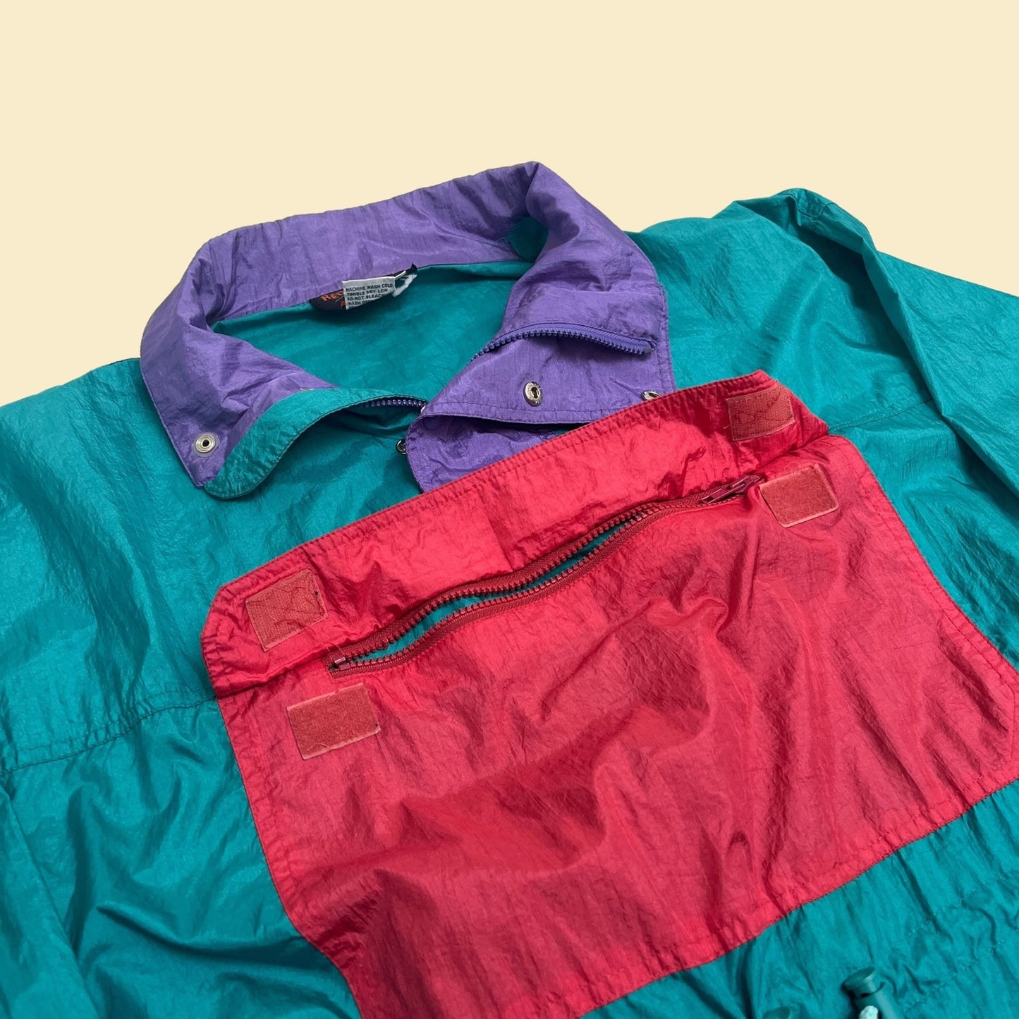 80s pullover windbreaker in size large by Red Pepper Action Wear, vintage 1980s color block track jacket in teal purple and pink