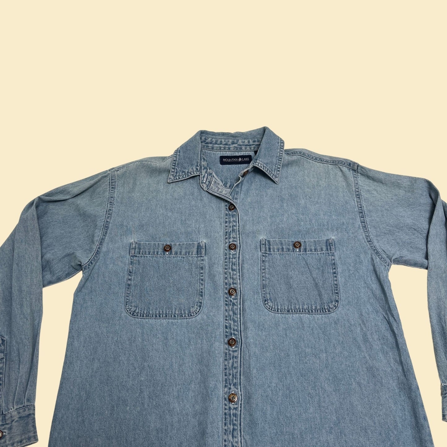 90s chambray shirt by Mountain Lake in size small, vintage 1990s denim button down with amber/brown buttons