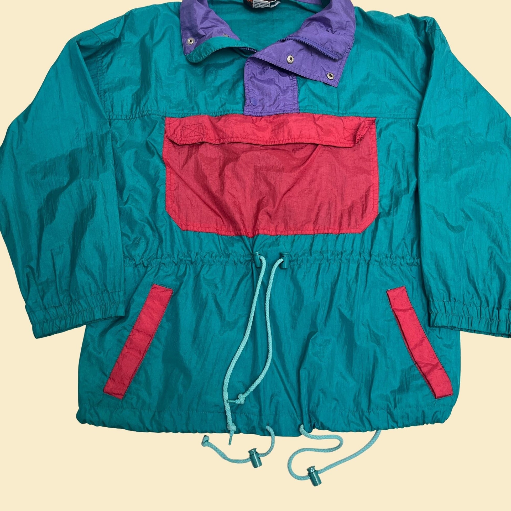 80s pullover windbreaker in size large by Red Pepper Action Wear, vintage 1980s color block track jacket in teal purple and pink