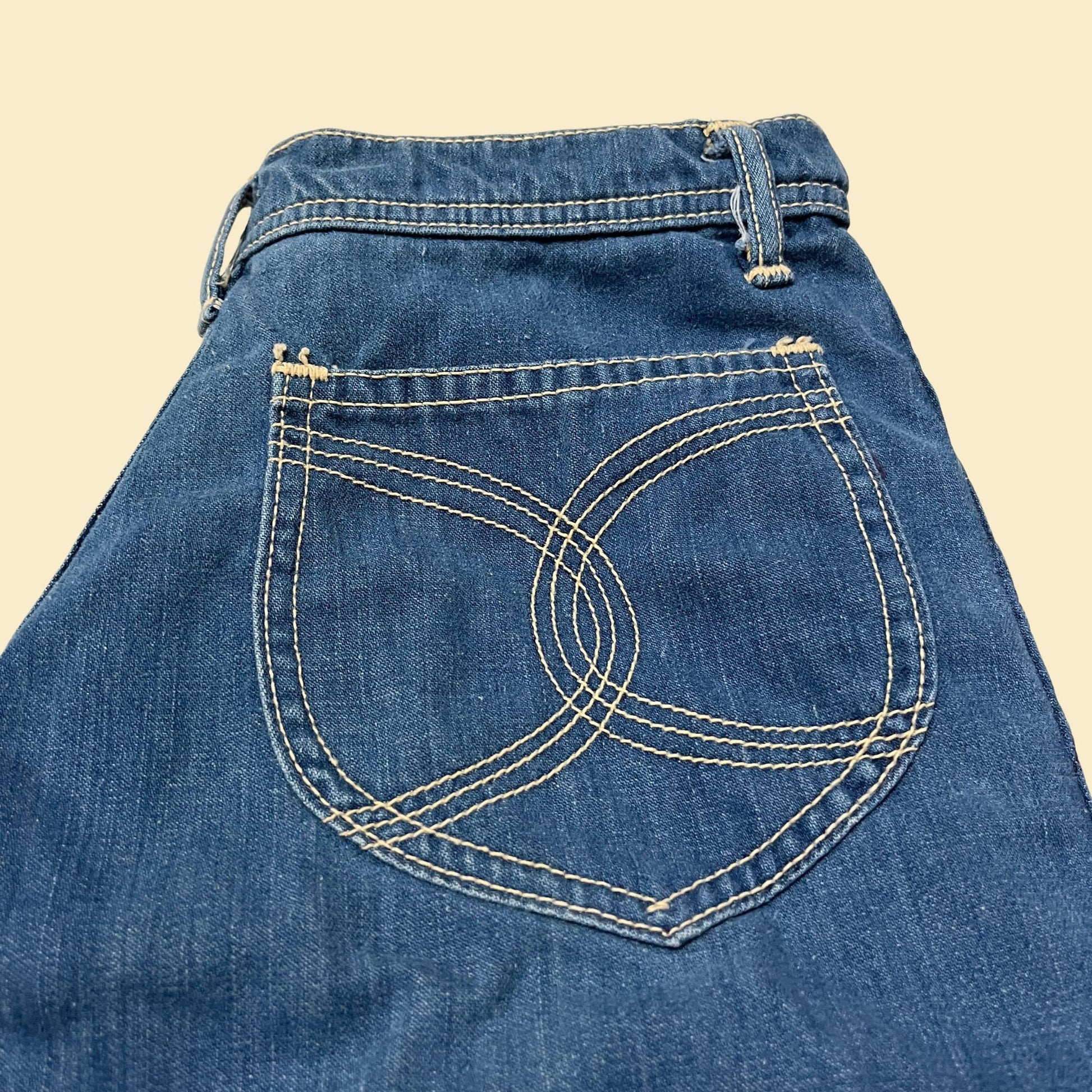 1970s straight leg jeans, 28" waist, vintage 70s medium wash cotton jeans with pockets