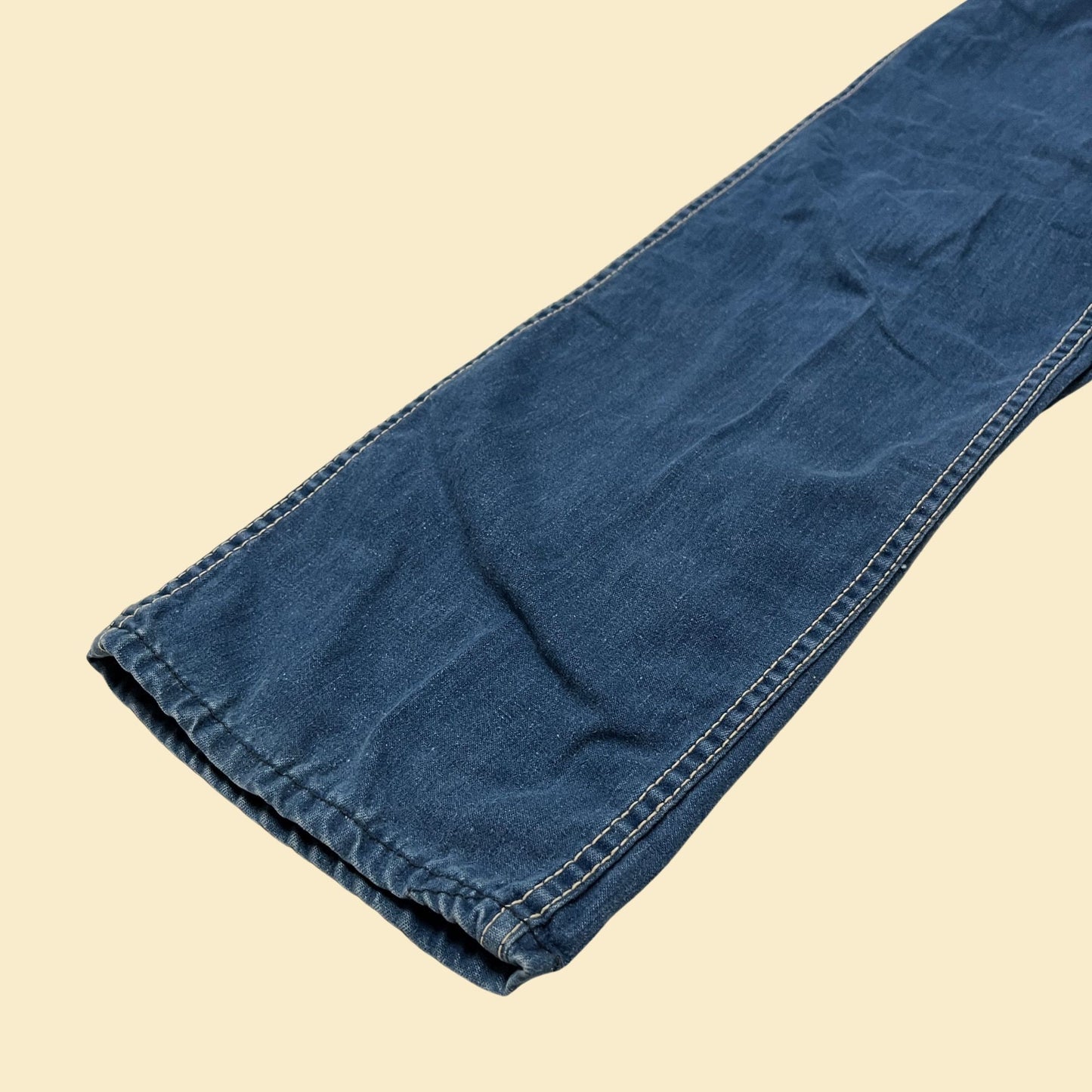 1970s straight leg jeans, 28" waist, vintage 70s medium wash cotton jeans with pockets