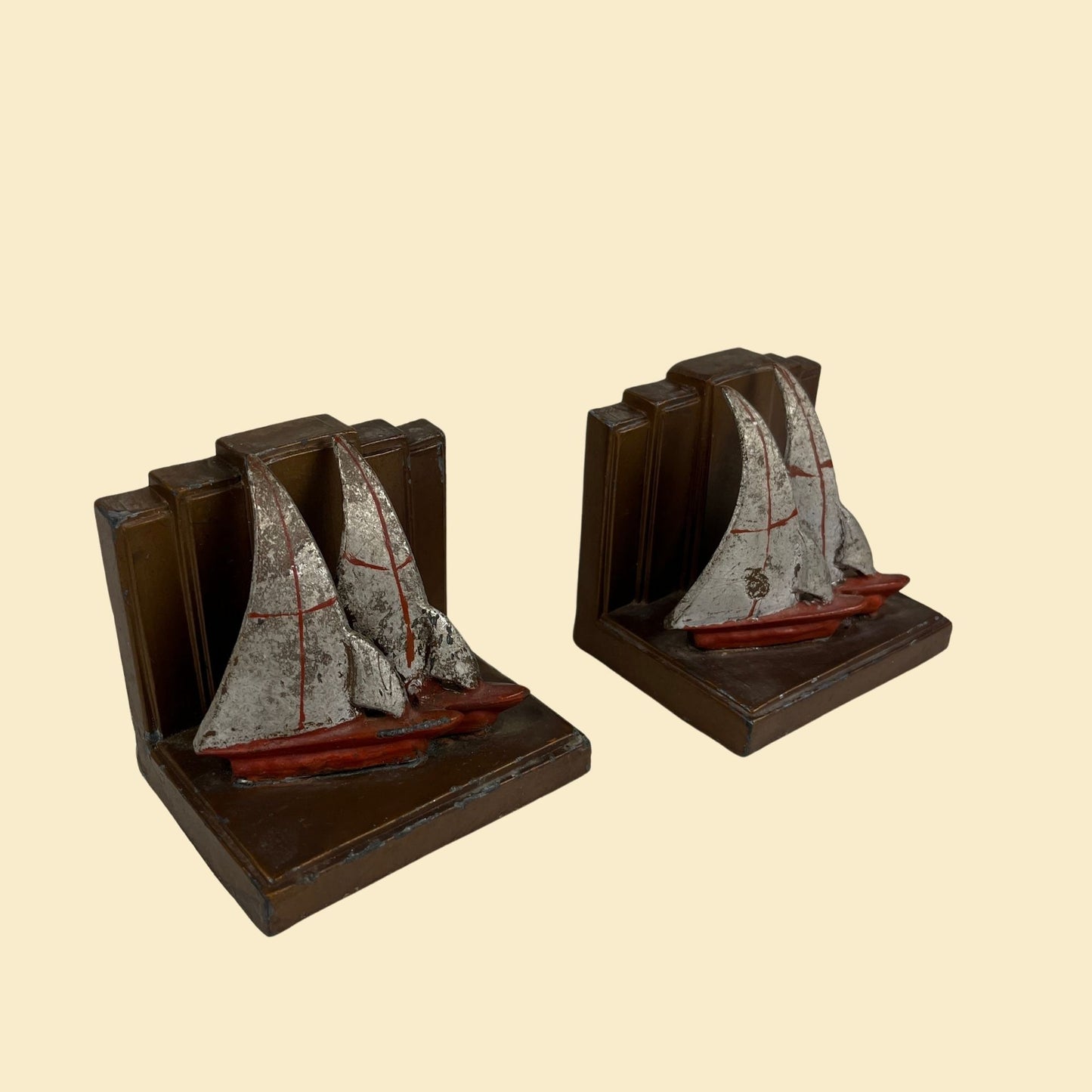 Art deco sailboat bookends, c. 1920s-1930s vintage sailboat heavy book ends, red, grey & copper colored