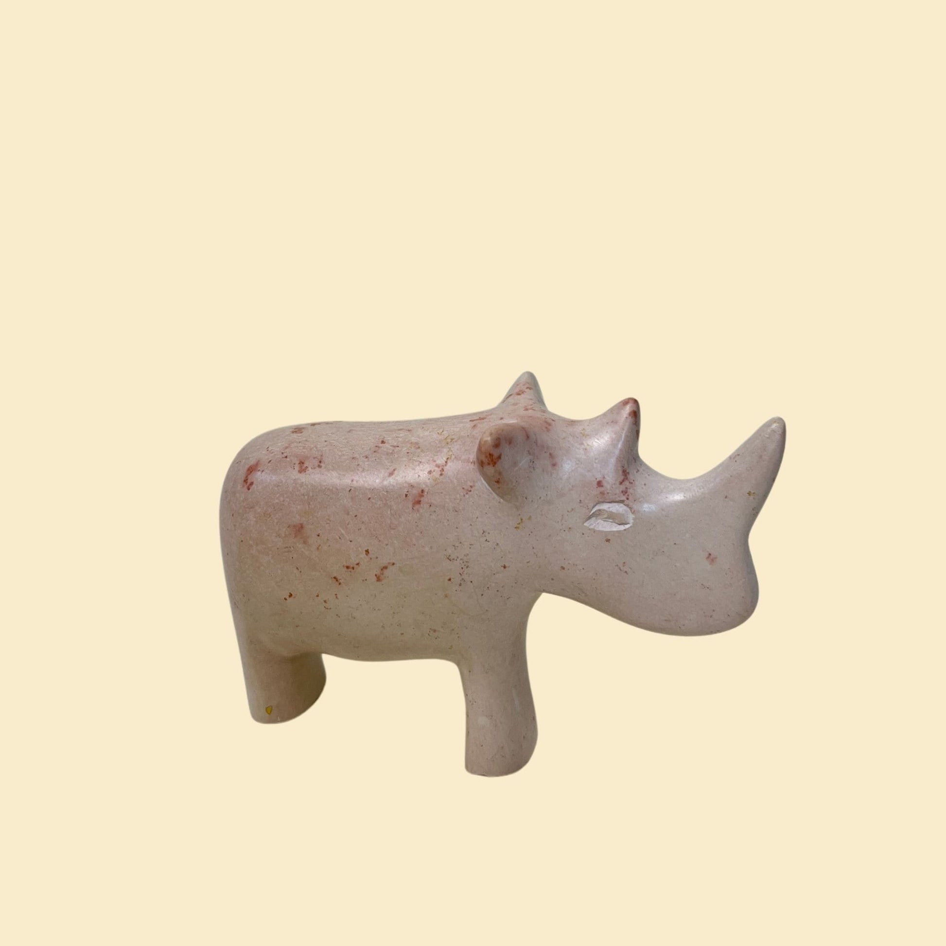 Vintage rhino sculpture, hand carved 1970s pink & white miniature rhinoceros figurine