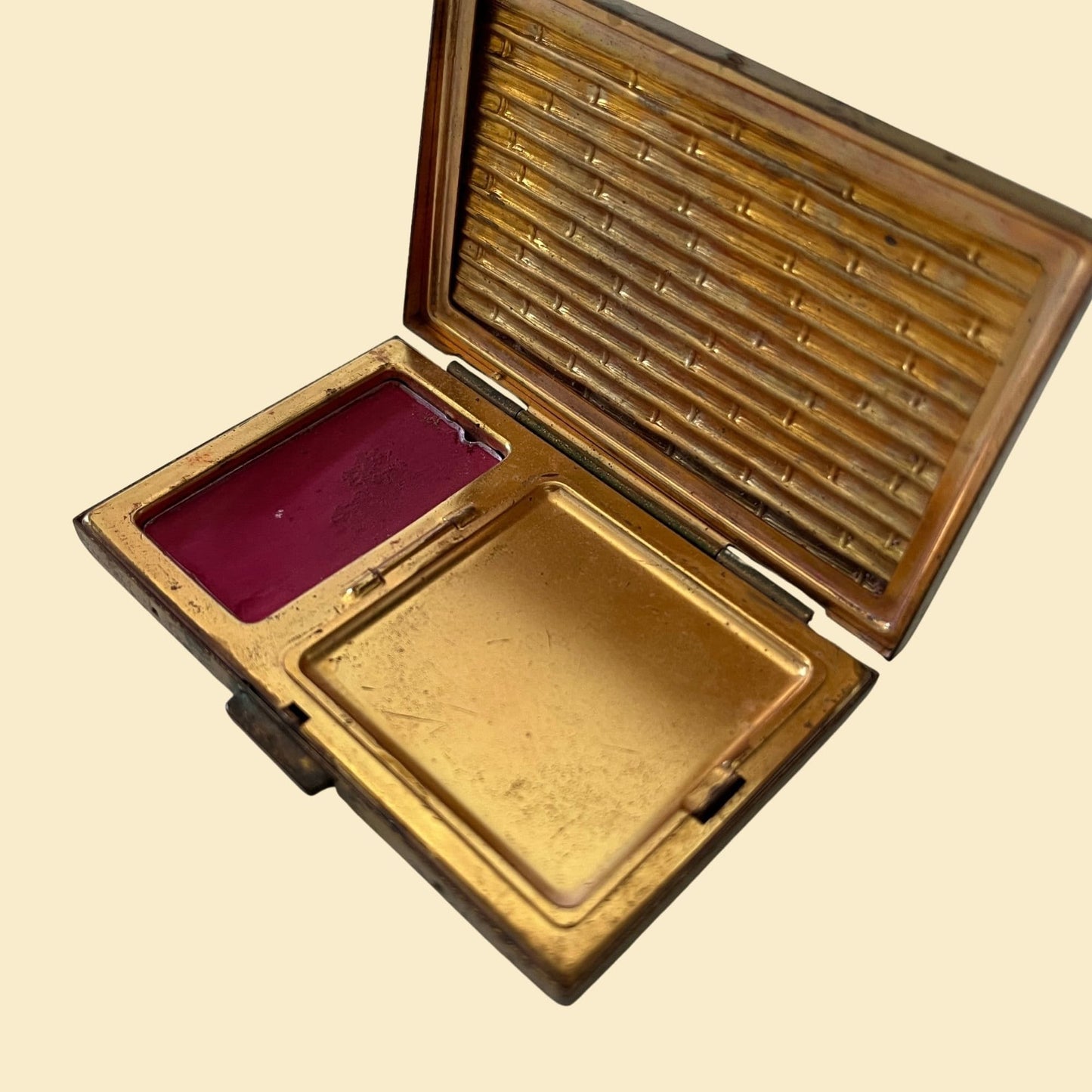 Vintage 1950s Avon cosmetic compact with bamboo pattern, rectangular gold/bronze toned makeup compact