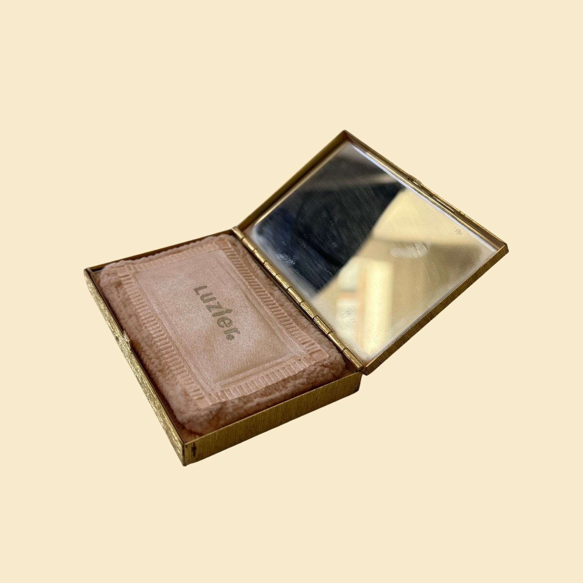 Vintage 1930s cosmetic compact by Luzier, rectangular gold/brass vanity makeup compact with mirror