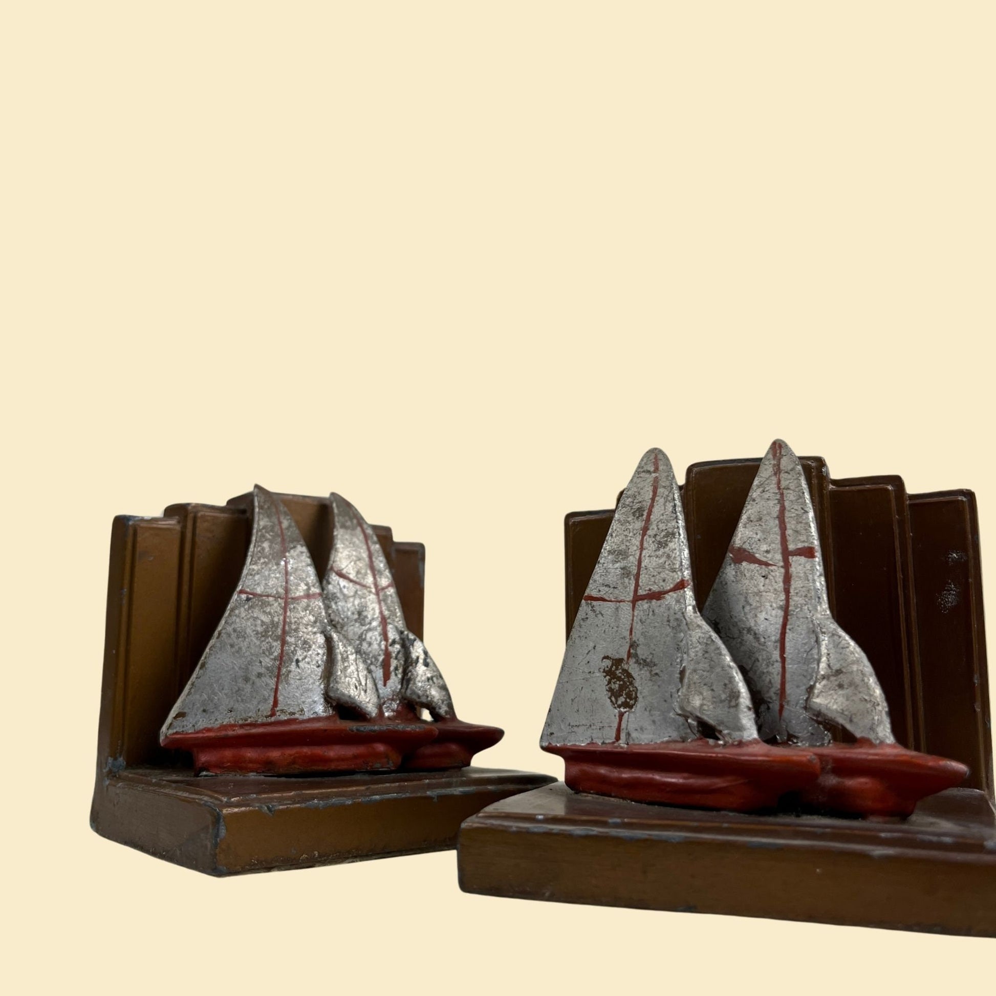 Art deco sailboat bookends, c. 1920s-1930s vintage sailboat heavy book ends, red, grey & copper colored