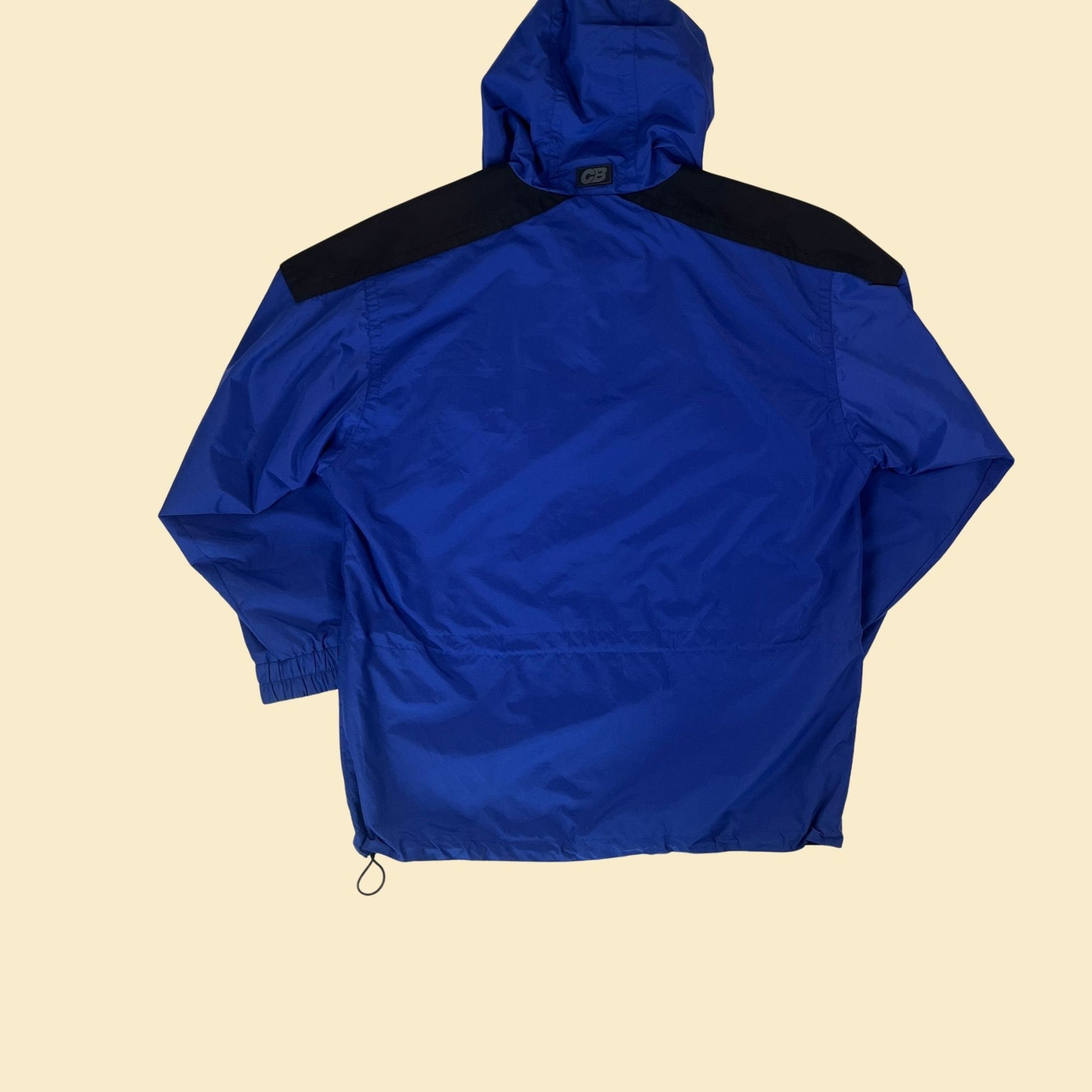 Vintage 90s blue hooded windbreaker by CB Sports, size L 1990s men's colorblock blue & black nylon hoodie with center pocket