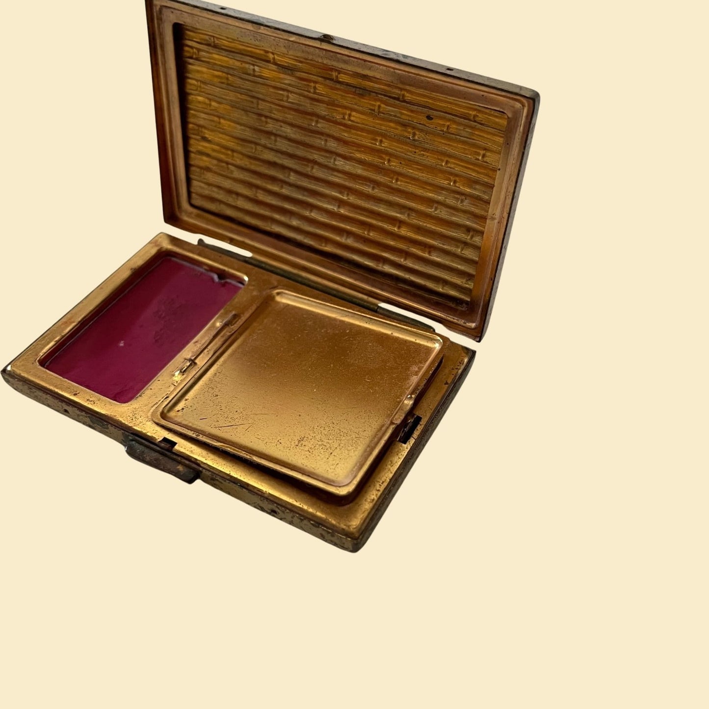 Vintage 1950s Avon cosmetic compact with bamboo pattern, rectangular gold/bronze toned makeup compact