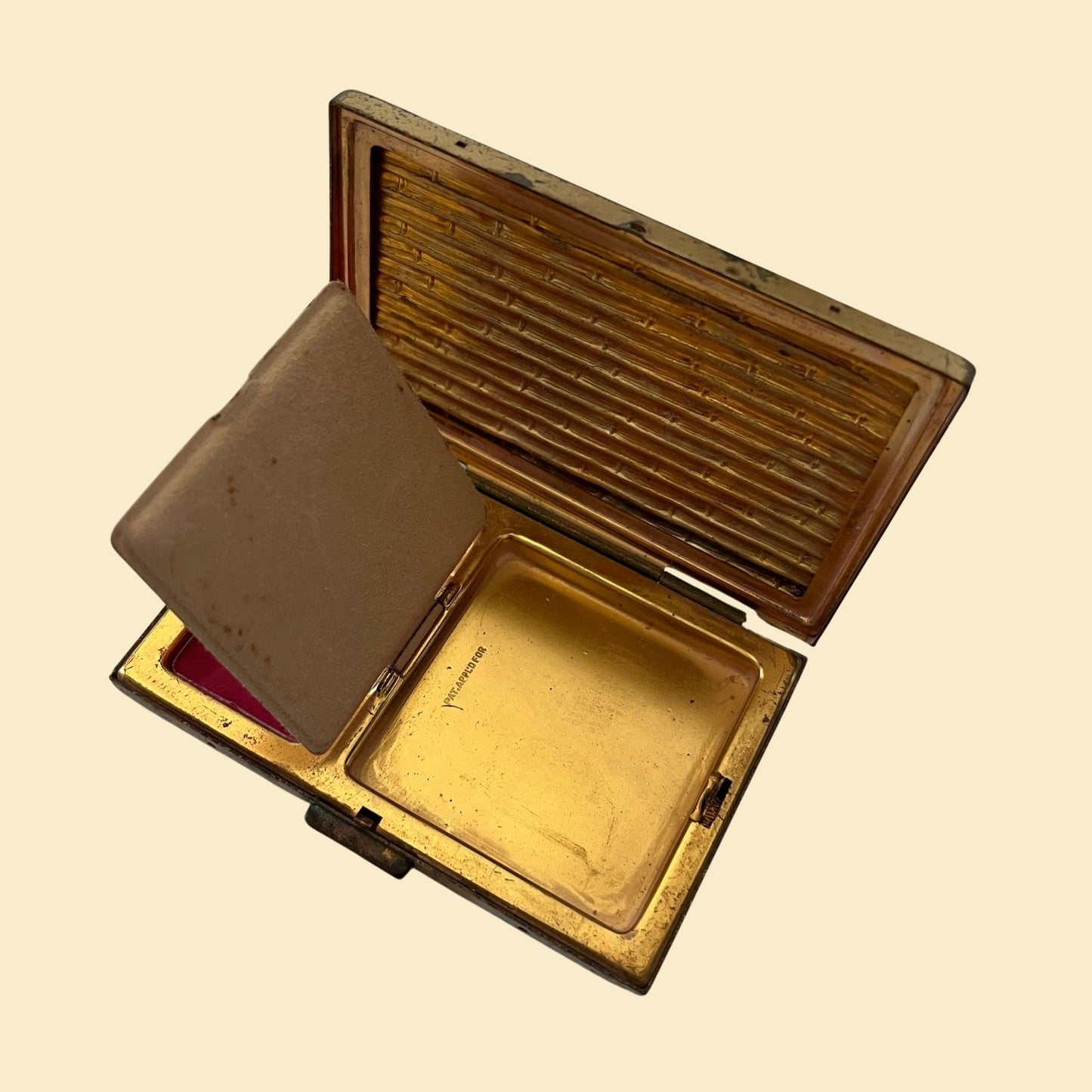 Vintage 1950s Avon cosmetic compact with bamboo pattern, rectangular gold/bronze toned makeup compact