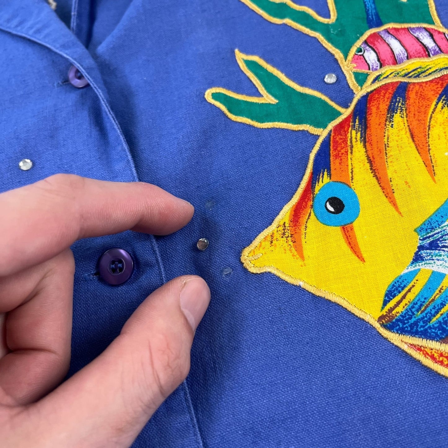 90s bedazzled fish shirt in size 1X by The Quacker Factory, vintage blue and rainbow women's 1990s blouse