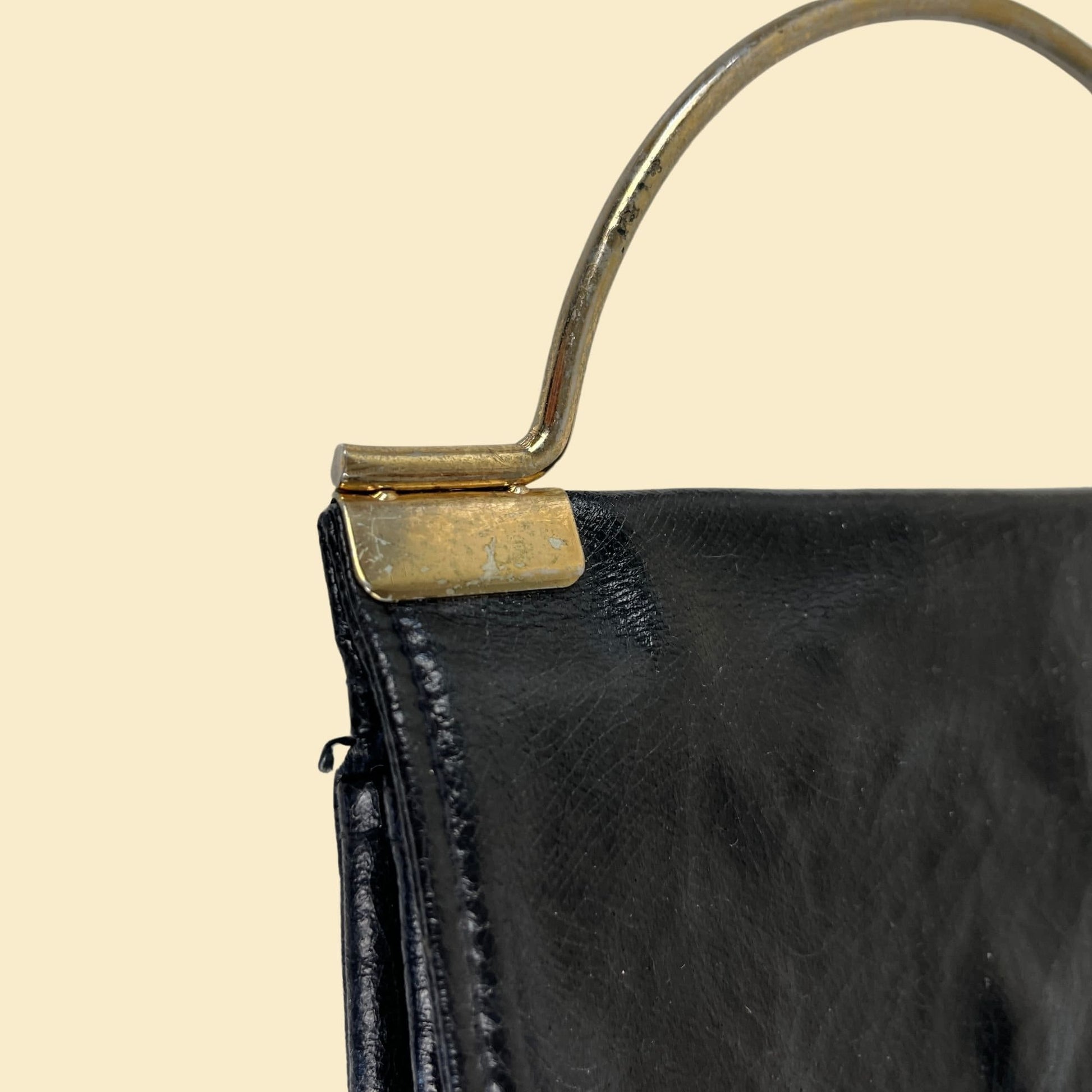 70s black handbag w/ metal top handle