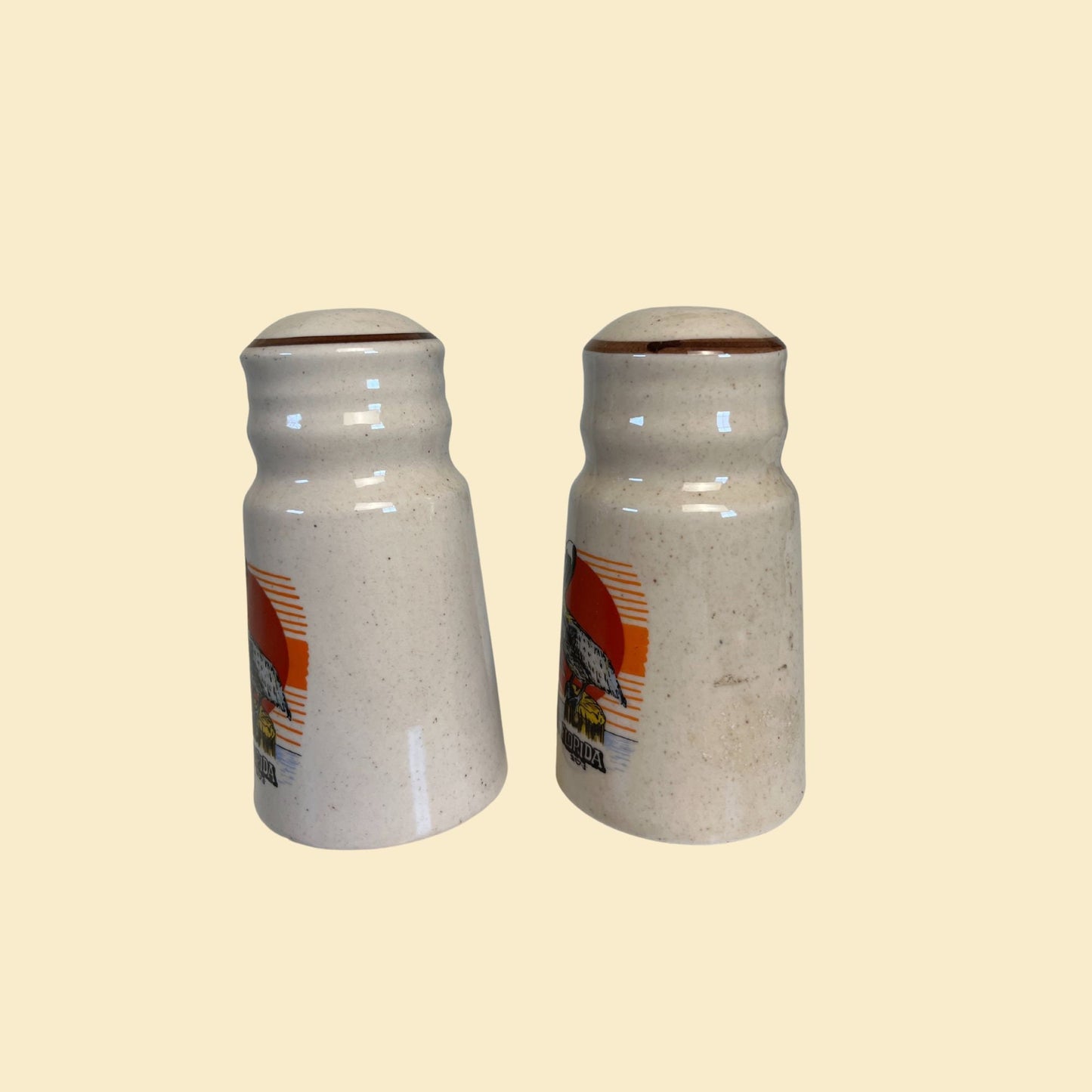 Vintage 80s Florida shakers, Pelican patterned stoneware salt and pepper shakers