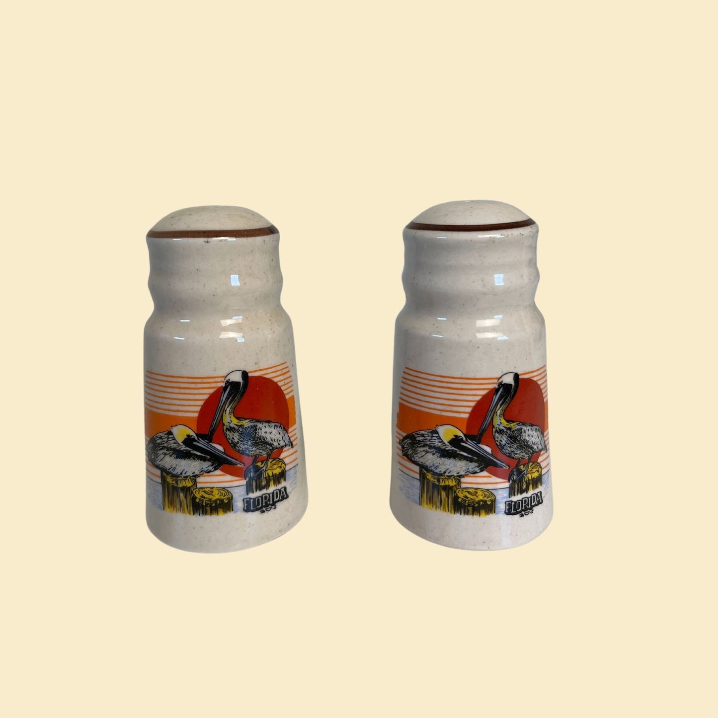 Vintage 80s Florida shakers, Pelican patterned stoneware salt and pepper shakers